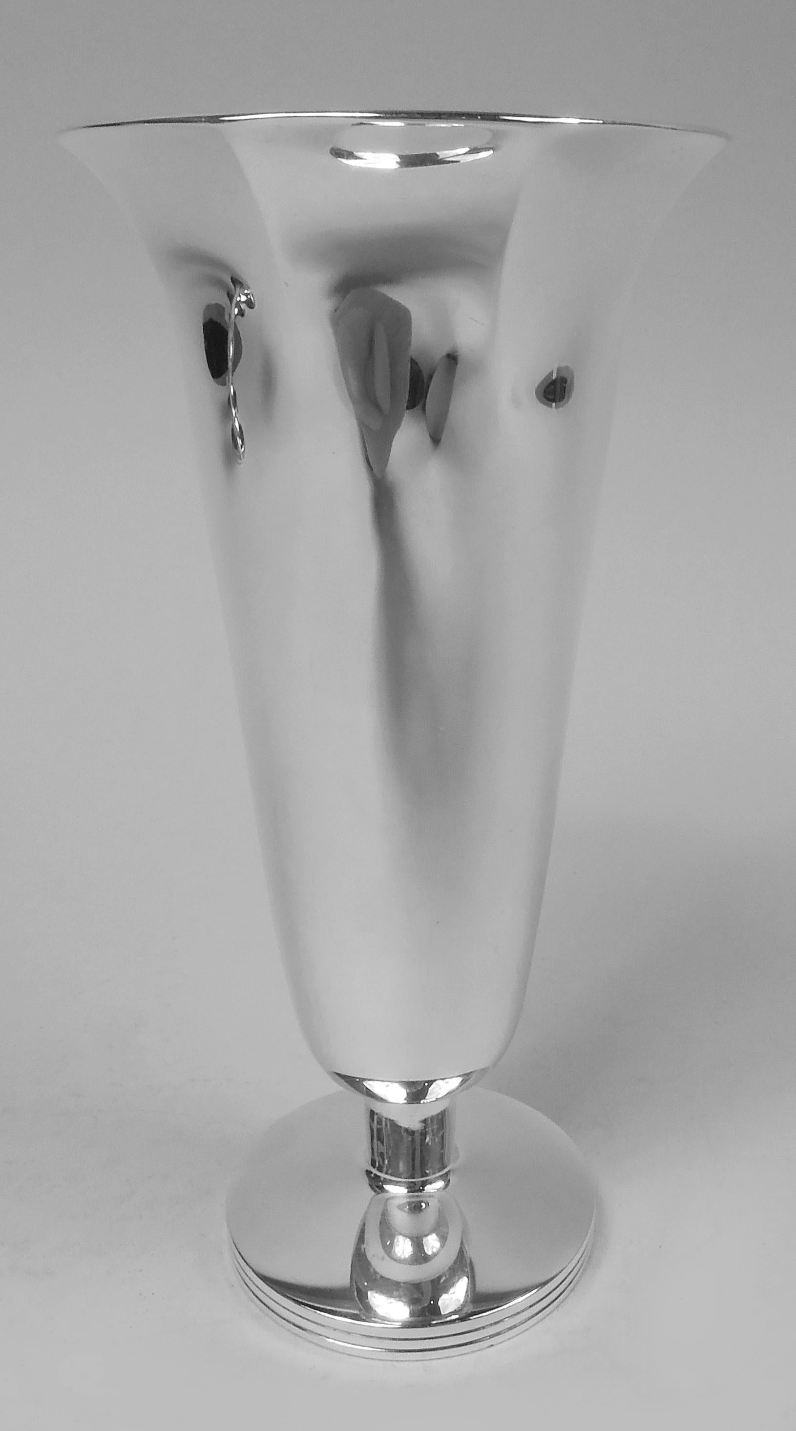 Modern Classical sterling silver vase. Made by Sotirio Bulgari in London in 1989 Tapering bowl with faceted and flared rim and gilt interior; short cylindrical stem and round foot with reeded rim. Fully marked including maker’s and retailer’s