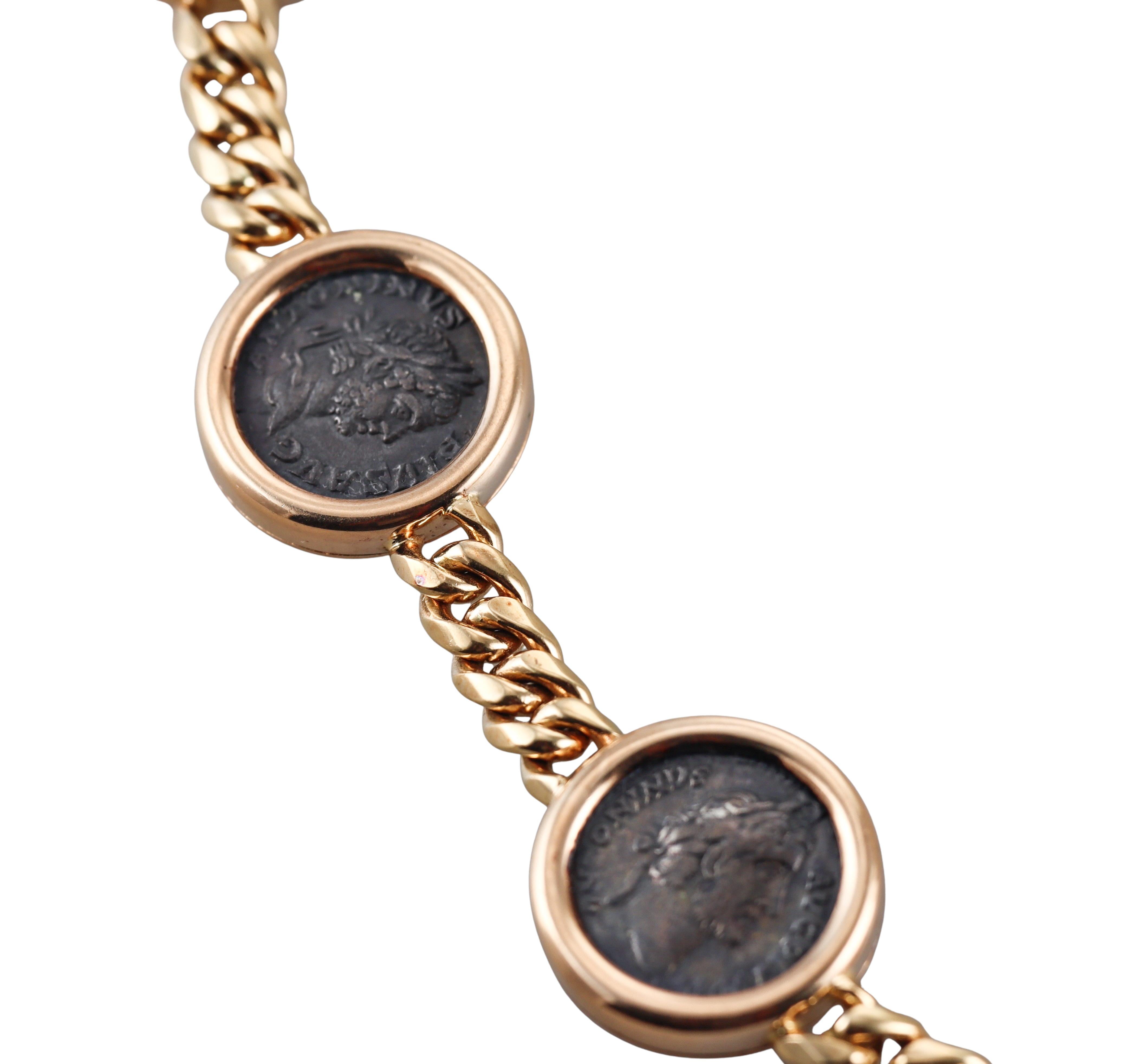 Rare Monete 18k rose gold necklace by Bvlgari, featuring 7 Roman ancient coins - each signed on the back: Elio Gabalo 219-222 d.C., Antonino Pio 158-161 d.C. ; Massimino Il Trace 235-238 d.C. ; Alessandro Severo 222-235 d.C.; Antonino Pio 138-116