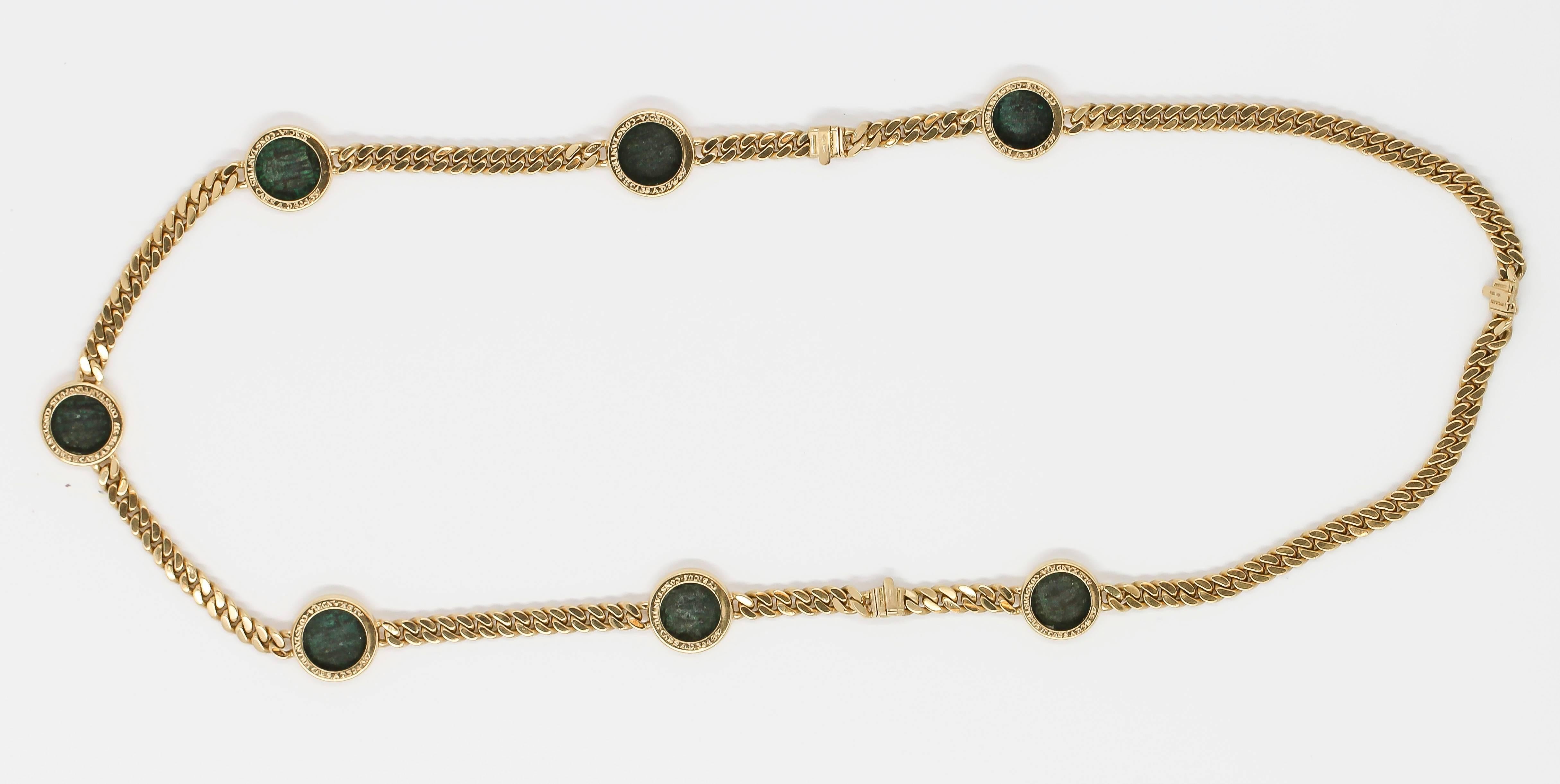 Rare and unusual 18K yellow gold and ancient coin link necklace and bracelet combination, by Bulgari circa 1970-80s. It features ancient Constantine II coins dating 316-337 A. D.  The Necklace combines with two bracelets to make one long necklace,