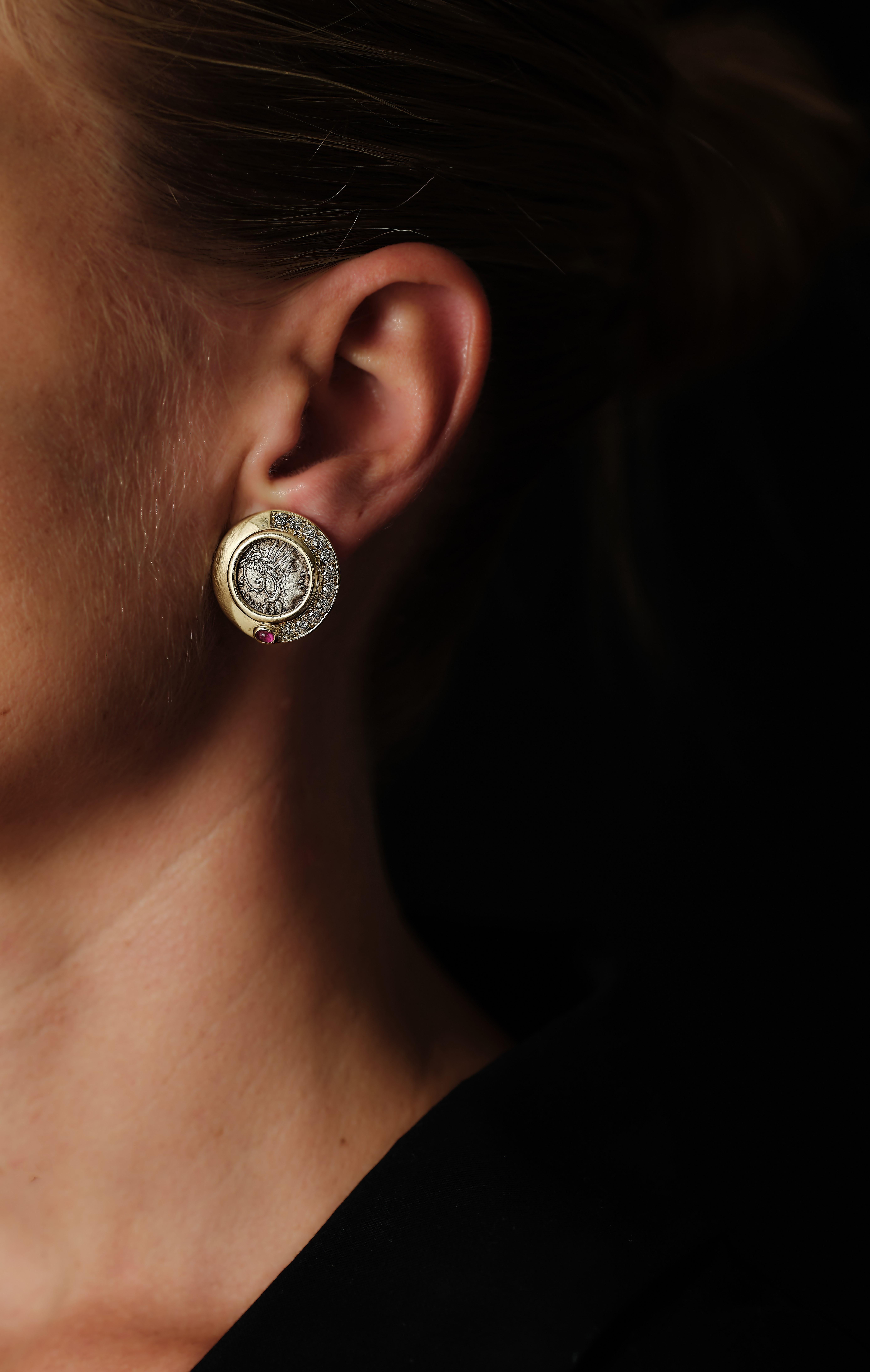 Modern Bulgari Monete earrings: ancient silver coins, 18 kt gold, diamonds and rubies.