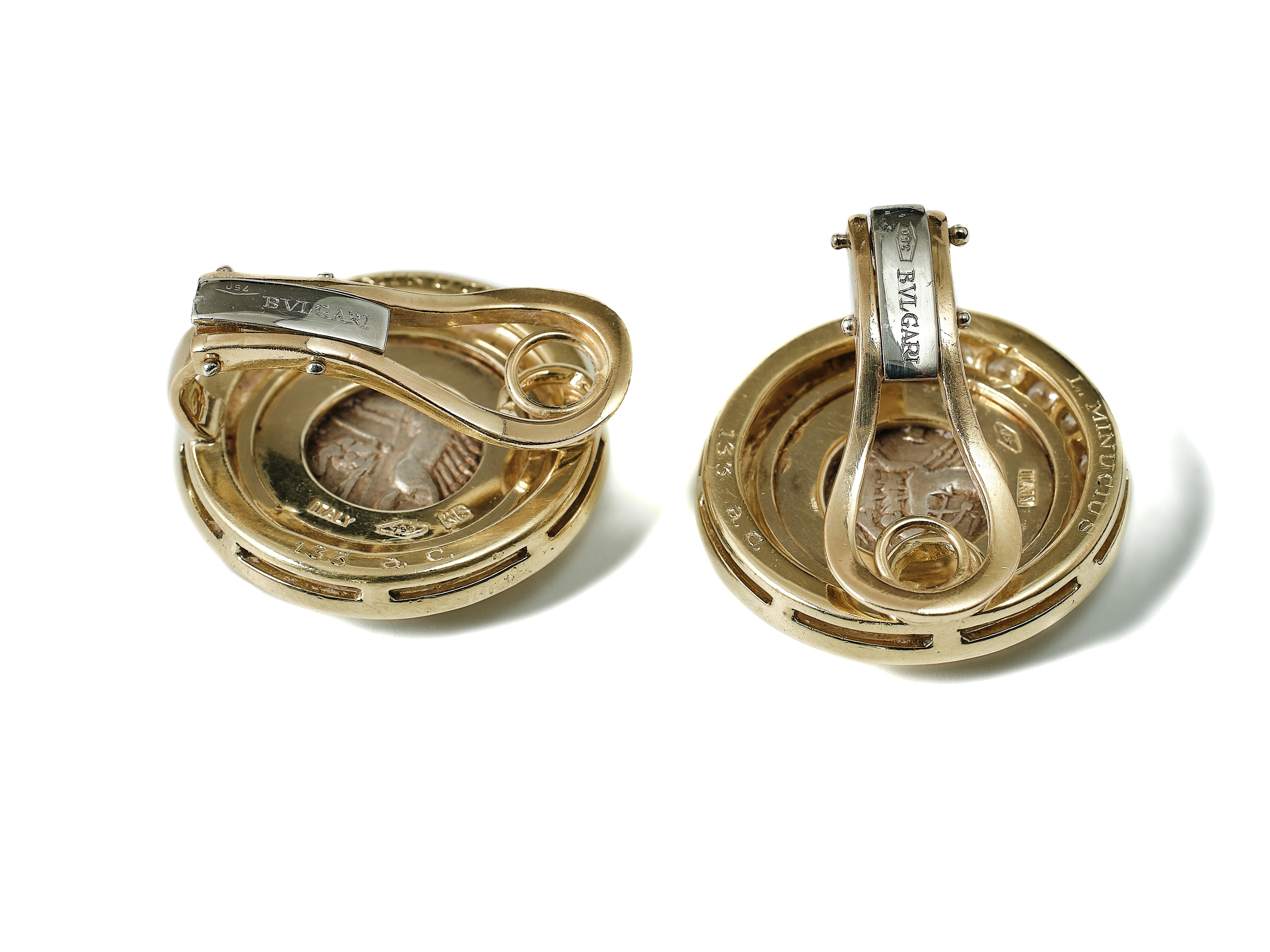 Women's Bulgari Monete earrings: ancient silver coins, 18 kt gold, diamonds and rubies.