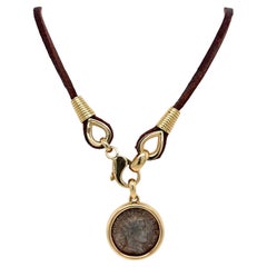 Bulgari Monet Imperial Roman in argento e pelle con ciondolo in oro giallo