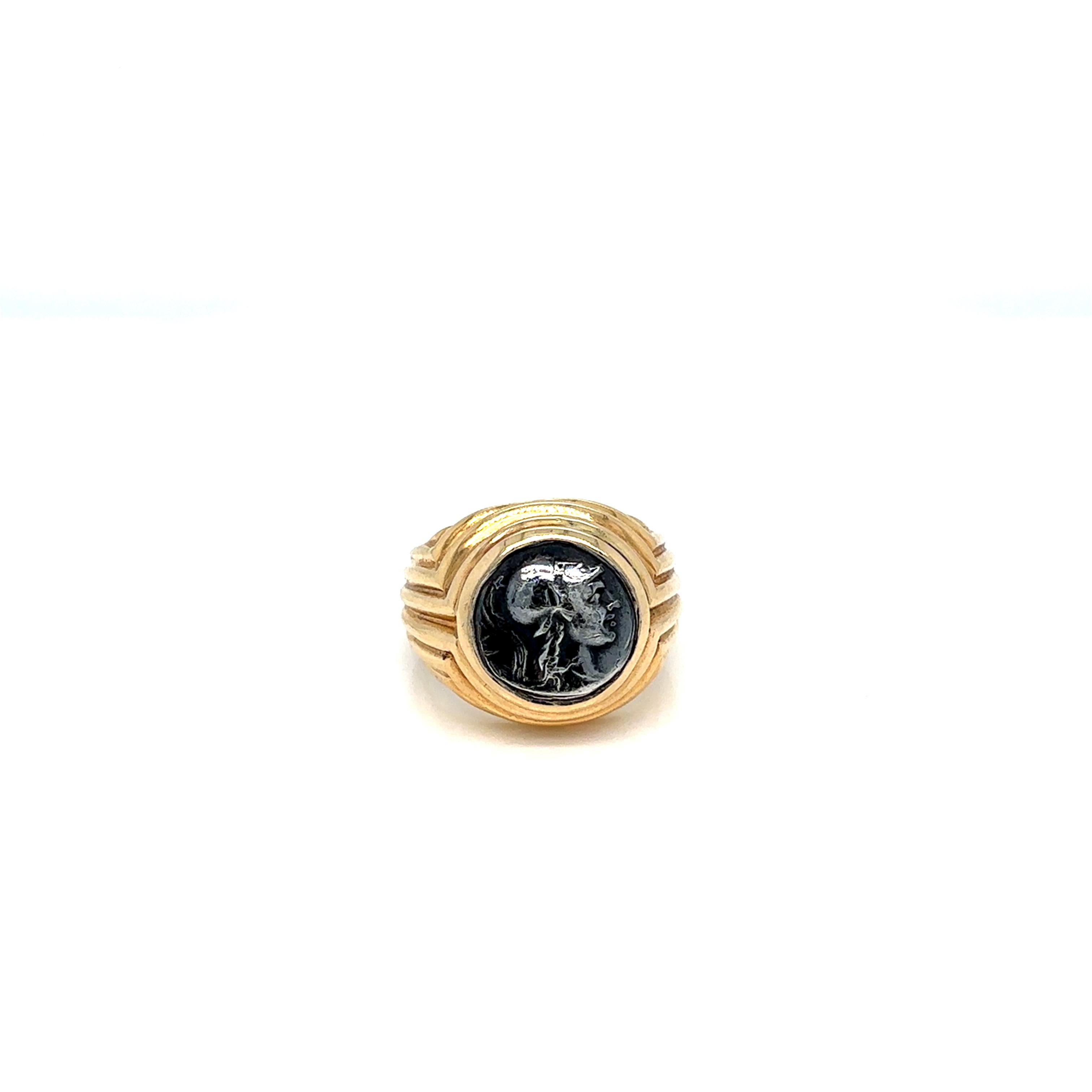Bulgari 18k gold ring from Monete collection, featuring ancient CARIA. Kaunos. Circa 166-100 BC. Silver coin. 

Showing Helmeted head of Athena just how alluring a 2.000-year-old coin can look when combined with a bold, contemporary setting, today