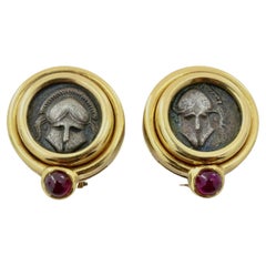 Orecchini Bulgari Monet in rubino, oro, argento antico e raro