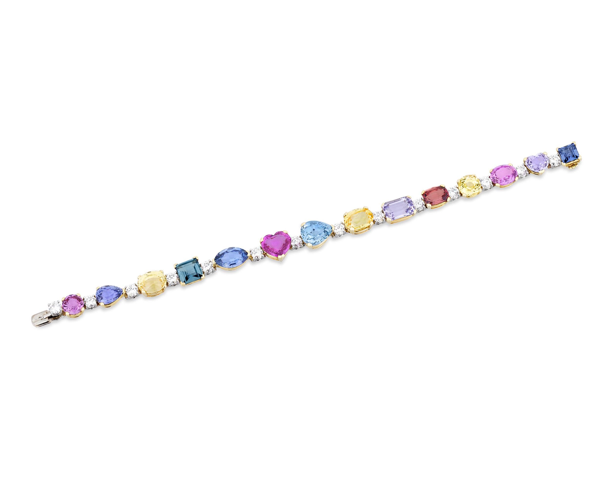 A remarkable spectrum of color is showcased in this eye-catching sapphire and diamond bracelet crafted by the legendary Italian jeweler Bulgari. Rare multi-colored sapphires in diverse cuts totaling 47.30 carats sparkle in hues of canary yellow,