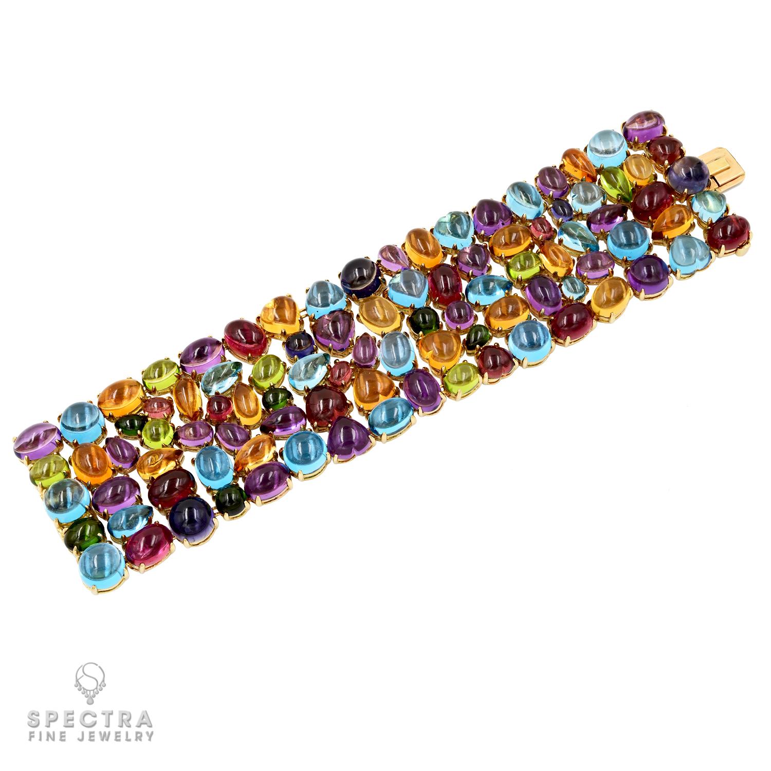 Step into a world of unparalleled elegance with the Bulgari Multi-Gem Allegra Bracelet, a timeless masterpiece reminiscent of the opulence and sophistication of the early 2000s. Crafted circa 2003, this exquisite bracelet features a mesmerizing