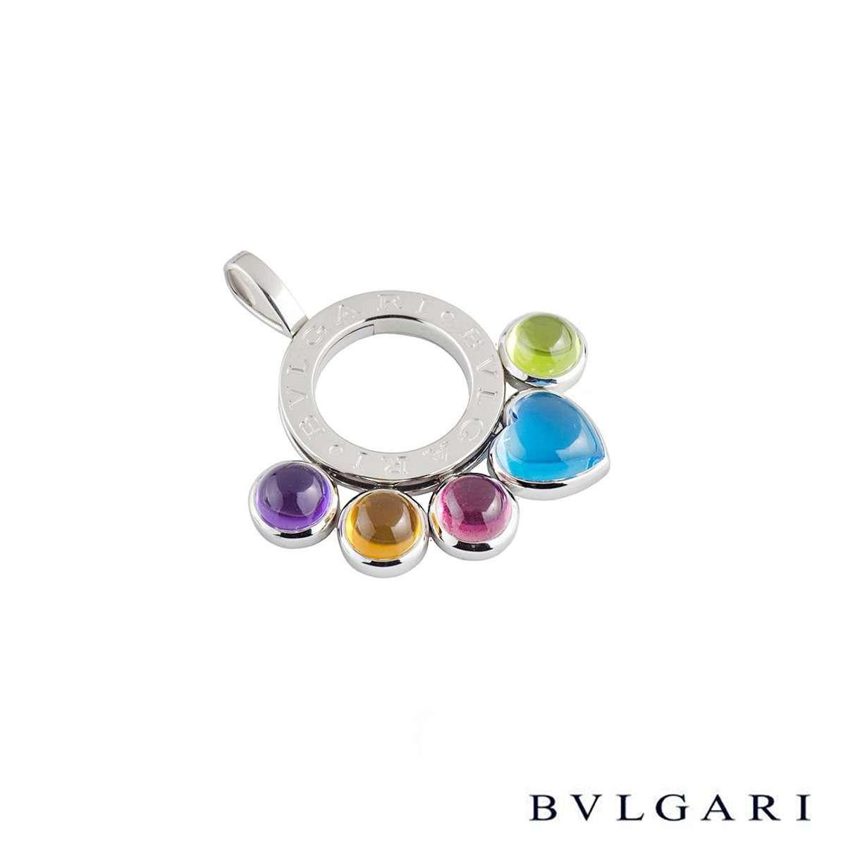 A colourful 18k white gold Bvlgari pendant from the Allegra collection. The pendant is composed of an open work circle motif, engraved with 'Bvlgari Bvlgari' throughout the centre. Suspended from the motif are 4 round cabochon cut multi-gemstones,