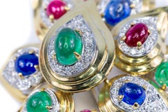 Bulgari Brosche mit mehreren Edelsteinen und Diamanten in Blumenform