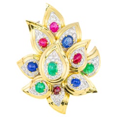Spilla floreale Bulgari con pietre multiple e diamanti
