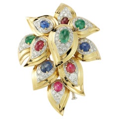 Spilla floreale Bulgari con pietre multiple e diamanti