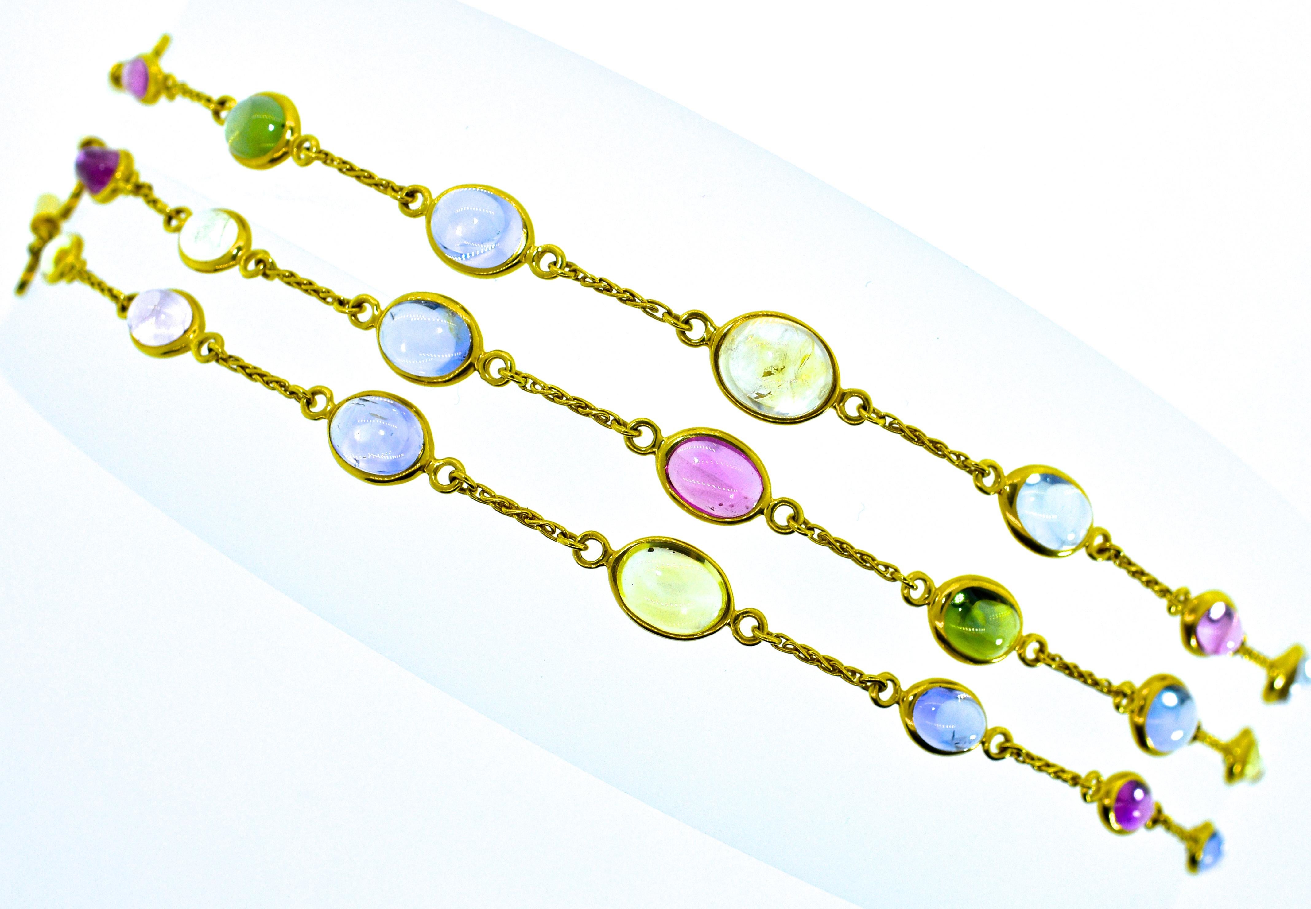 Bulgari multi color sapphire stones set in 18K.  This 18K yellow gold piece can be worn  as 3 bracelets - all just slightly more than 7 inches each and also clasped together as a necklace There are 21 natural sapphires weighing approximately 35 cts.