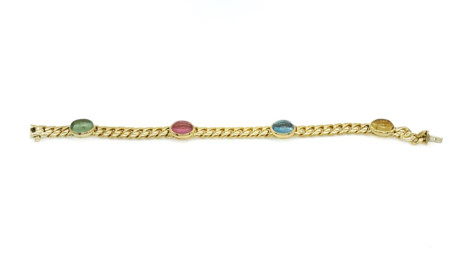 Bulgari 18 karat yellow gold curb link chain bracelet with multi-color stones (tourmalines, topaz, citrines). Made in Italy, circa 1980.