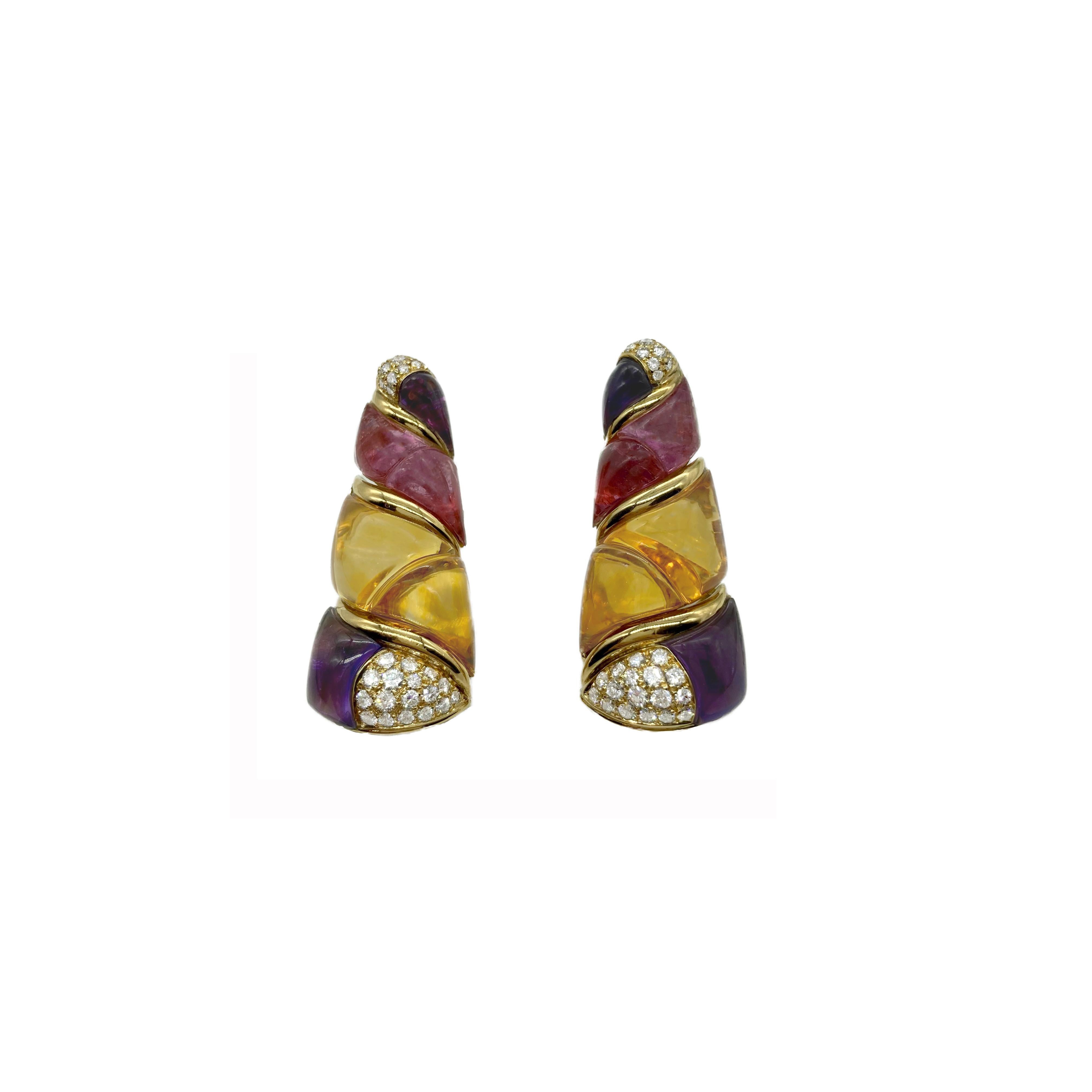 A chic pair of vintage Bulgari Naturalia earrings in 18 karat yellow gold, citrine, amethyst, and diamond. Made in Italy.