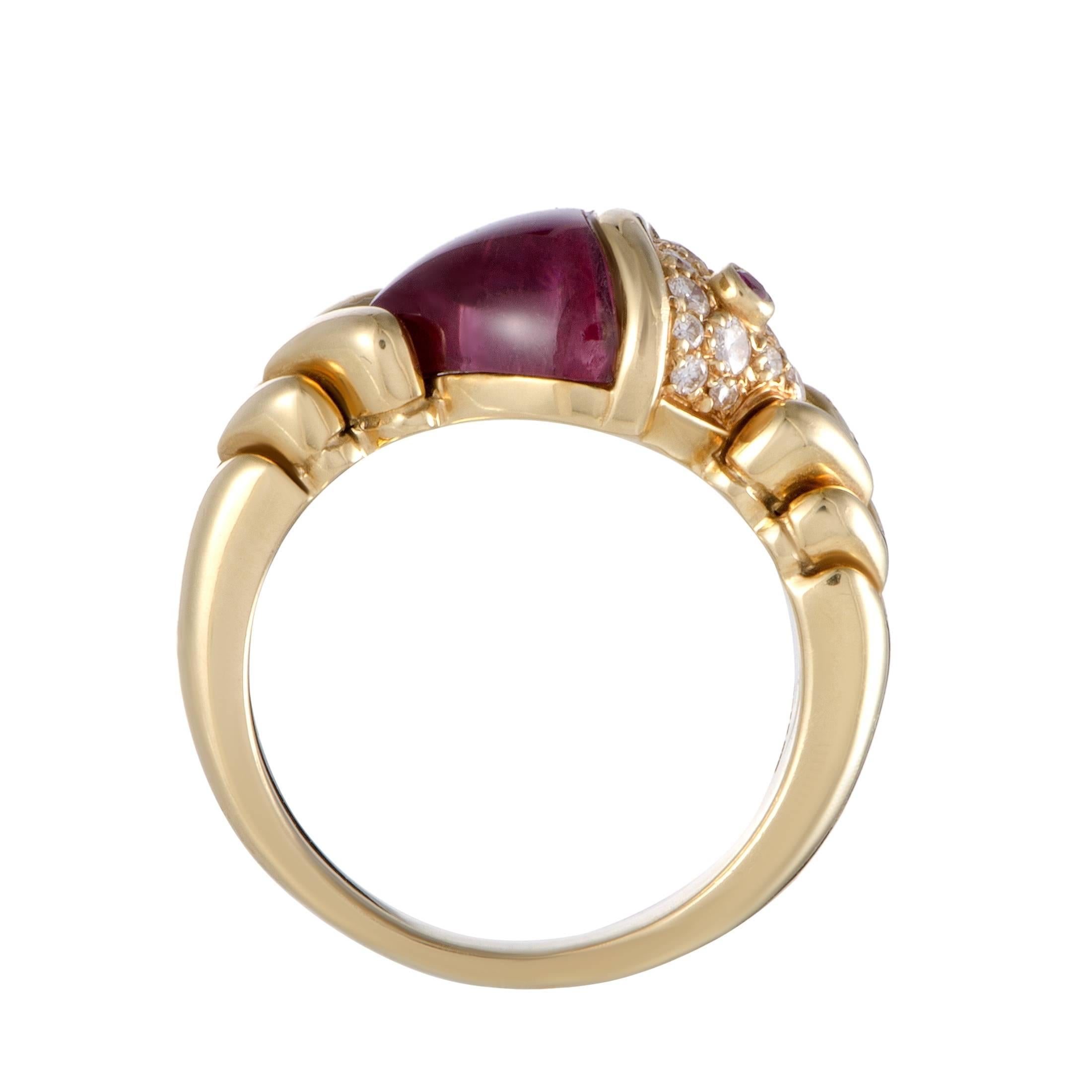 This spectacular 18K yellow gold ring by Bulgari epitomizes class and elegance. The stunning design includes sparkling 0.30ct diamonds, a gorgeous ruby and a mesmerizing pink tourmaline stone that gives the ring an extravagantly stylish appeal.