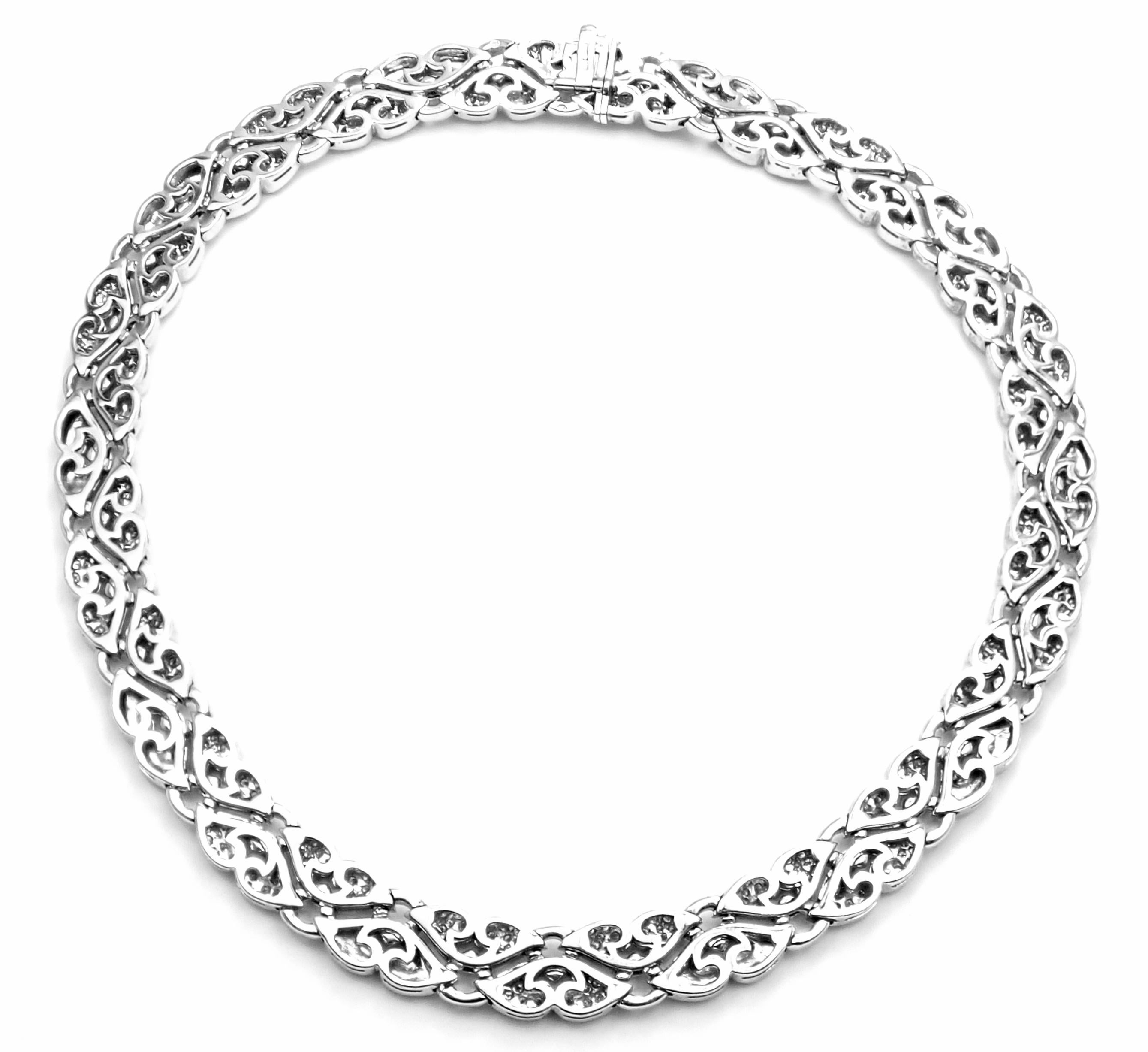 Platinum Nuvole 12ct Diamond Chocker Necklace by Bulgari. 
With 810 round brilliant cut diamonds VVS1 clarity, E color total weight approx. 12ct
Details:
Chain Length: 16'' 
Width: 13mm
Pendant: 2
