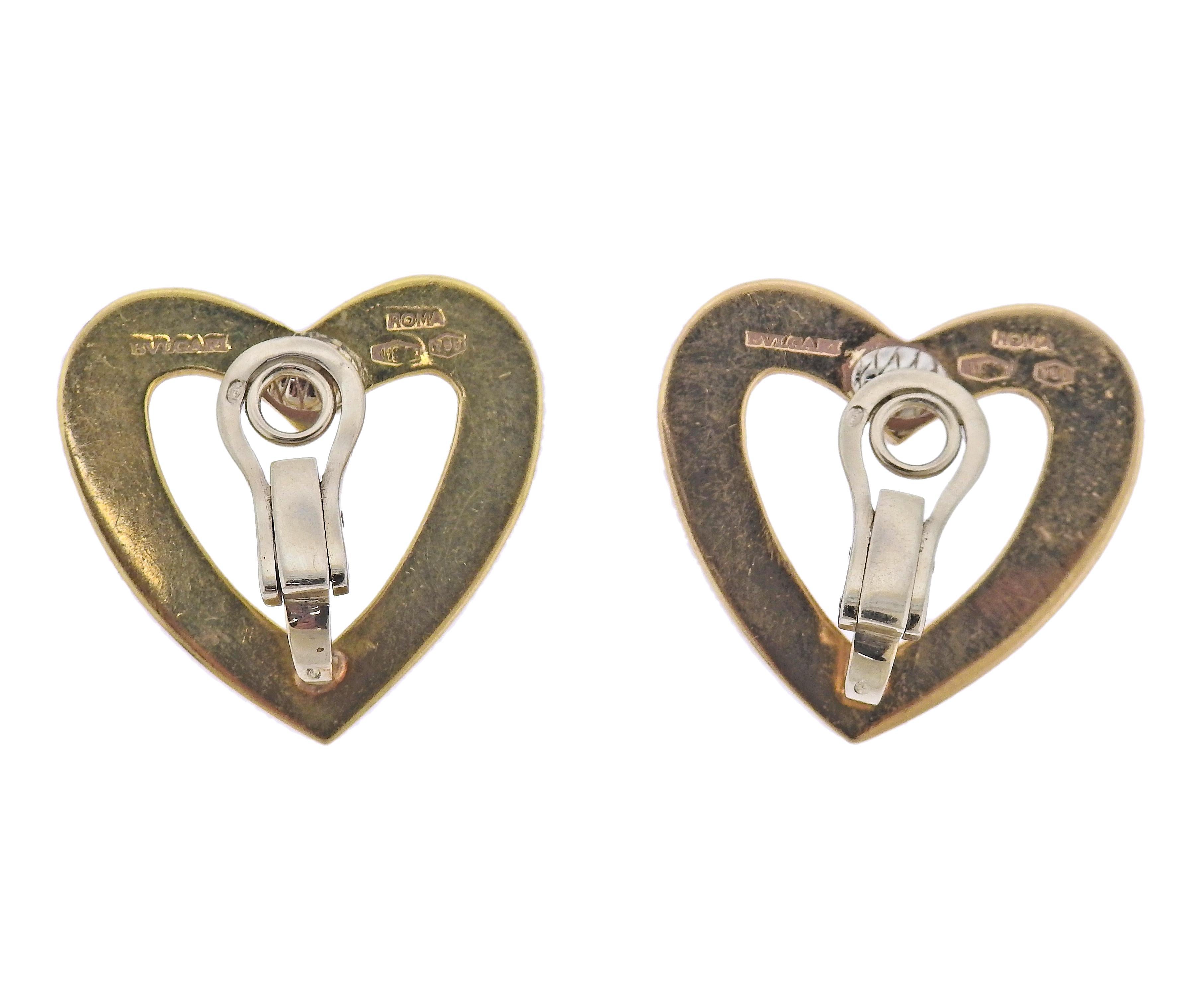 Pair of 18k gold open heart earrings by Bvlgari. Earrings measure 30mm x 29mm. Marked: Bvlgari, Roman, 750. Weight - 26.2 grams.