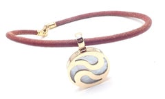 Bulgari Optical Illusion Spinning Mother Of Pearl Pendant Gold & Steel Necklace