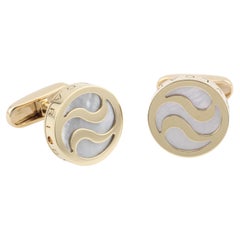 Bulgari Boutons de manchette coquillage optique en or 18 carats