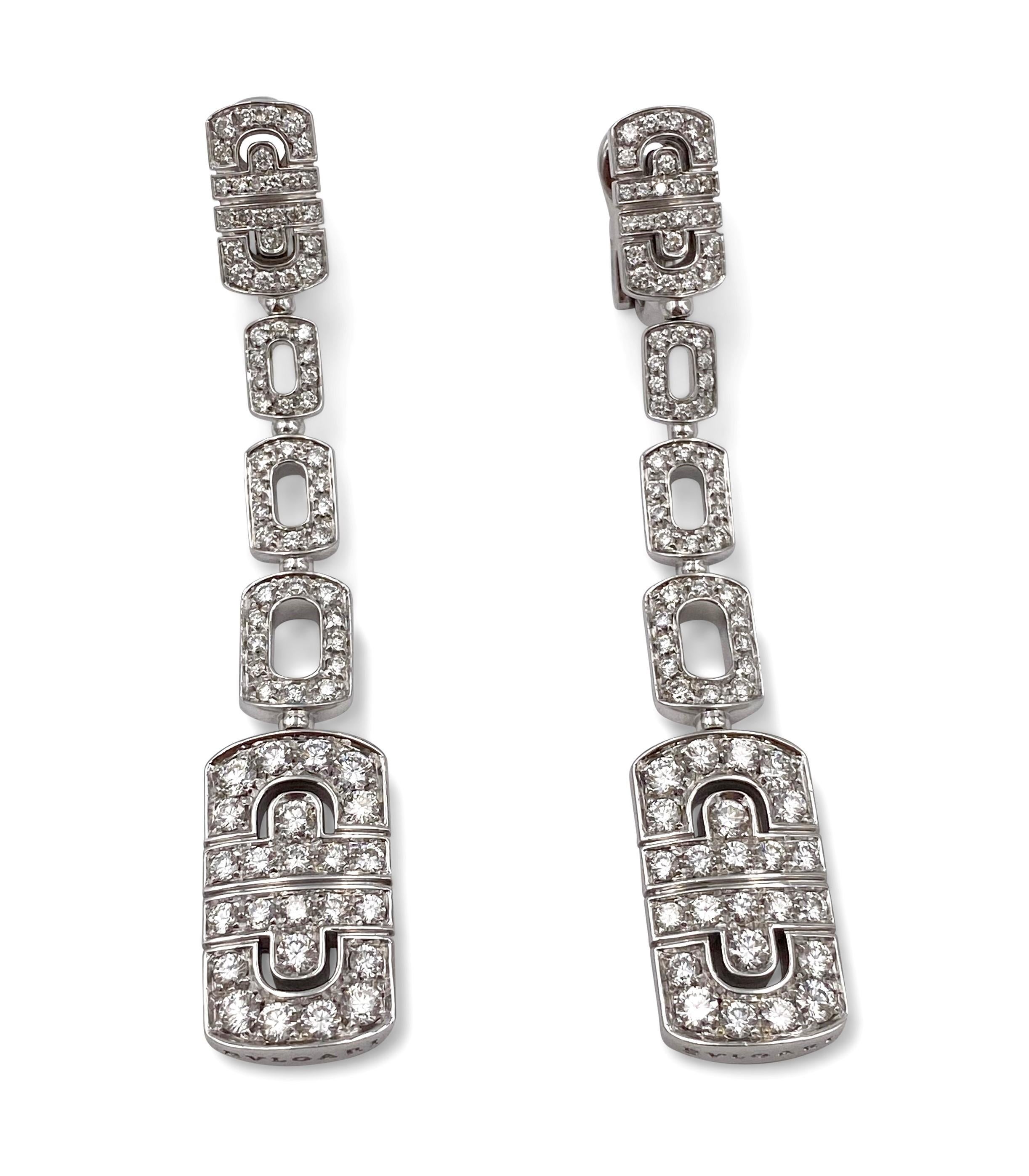 Authentic Bulgari Parentesi long earrings crafted in 18 karat white gold and set with approx. 1.65 carats of round brilliant cut diamonds (F color, VS clarity). The earrings measure 65mm in length, 12mm at widest point. Comes with the original