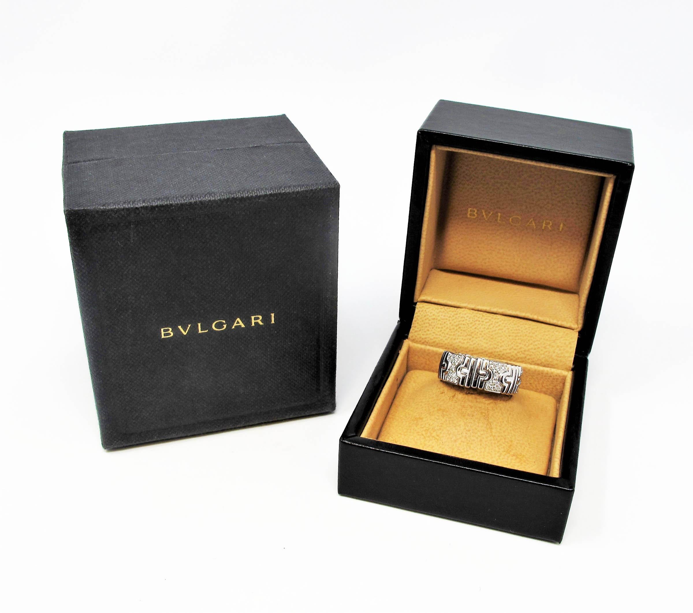 Chic designer diamond band ring by Italian luxury brand, Bulgari. This incredible textured Parentesi ring is expertly designed with a clean, contemporary feel. The diamond accents add just a touch of sparkle and elegance, making this a perfect