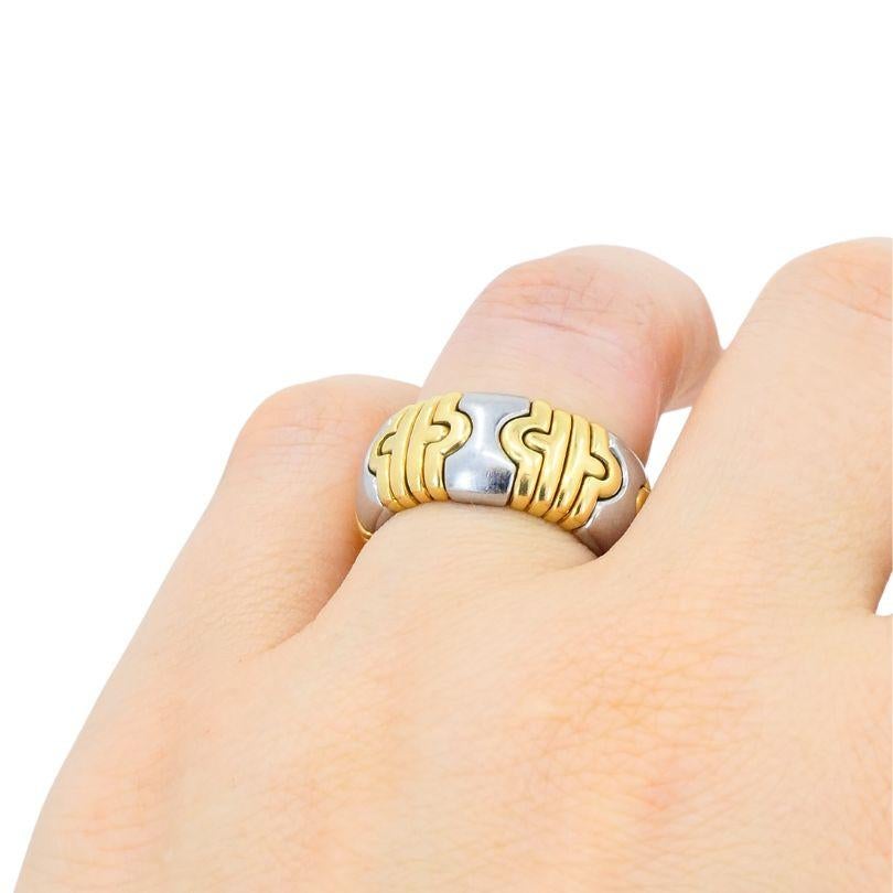 This Bvlgari ring from the 1980s is part of the brand's Parentesi collection, a design inspired by architectural motifs and Roman heritage. Crafted in 18k yellow gold, the ring features the distinctive Parentesi pattern, characterized by