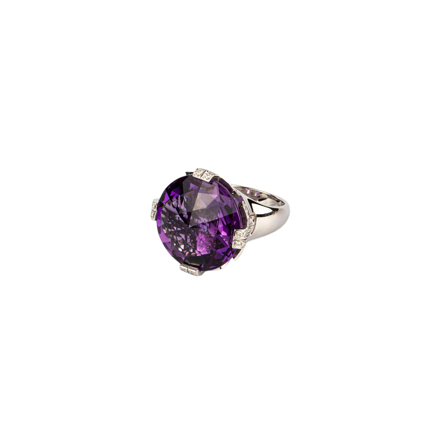 Bulgari ‘Parentesi’ ring in 18k white gold centered by a faceted amethyst with diamond details on the shank. Made in Italy, circa 1980.