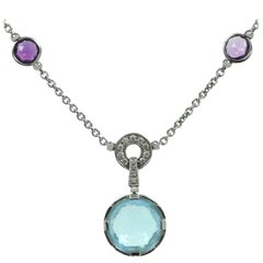Collier Bulgari « Parentesi Cocktail » en or blanc, avec topaze, améthyste et diamants