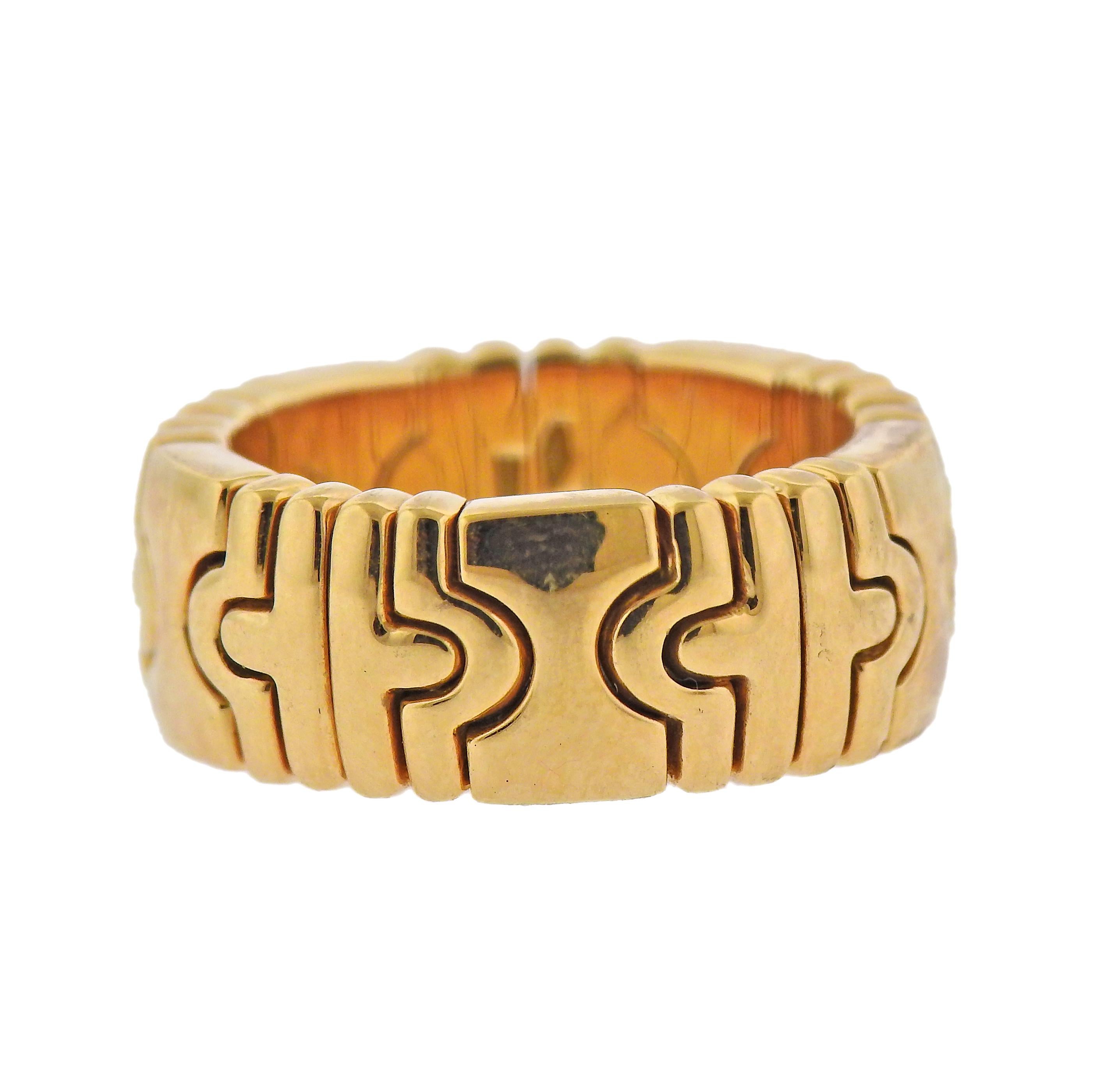 18k yellow gold Parentesi band ring by Bvlgari. Ring size - 5.25, ring is 8mm wide. Marked: Bvlgari, 750, Italian mark. Weight - 15 grams. 