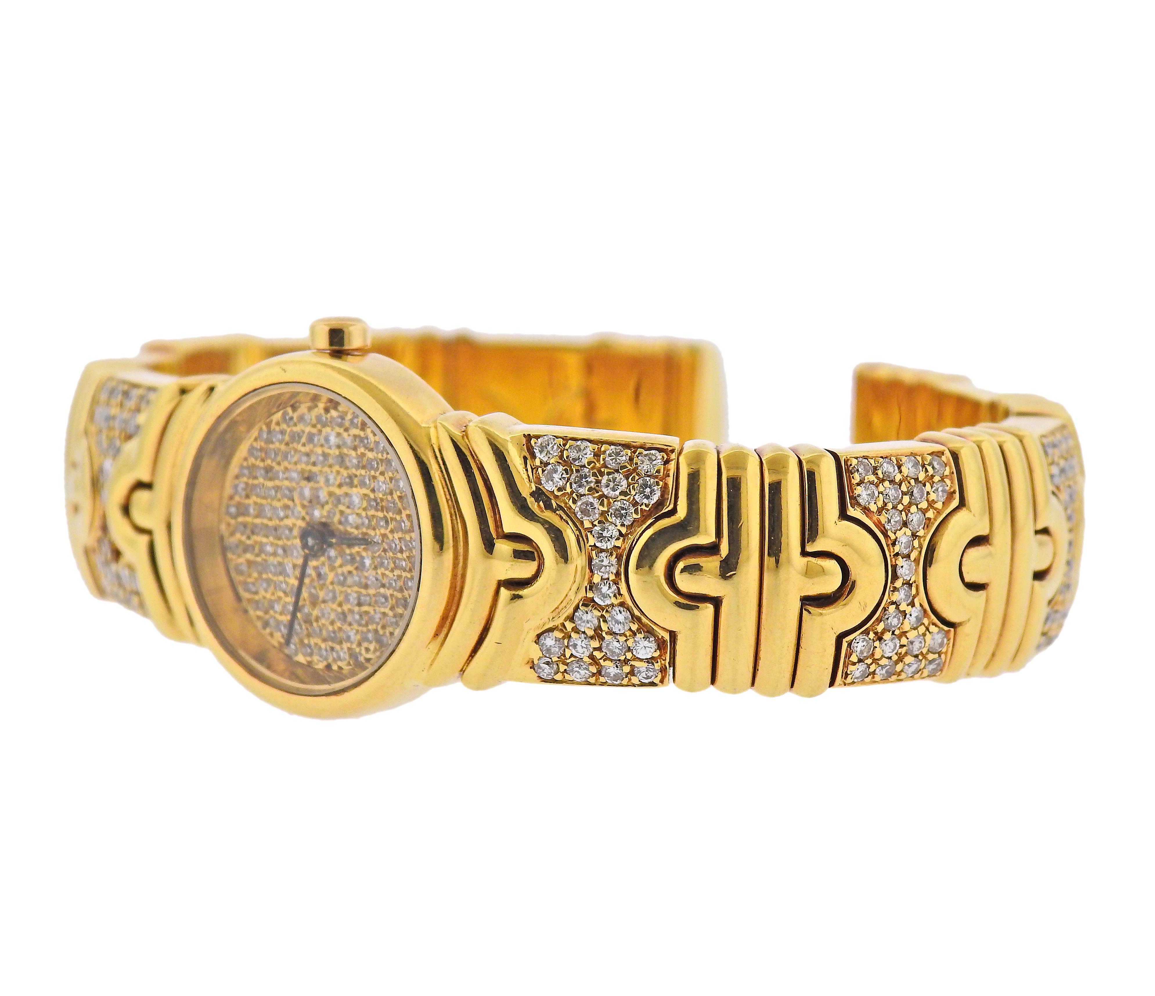Impressive 18k gold Parents watch bracelet by Bvlgari, decorated with a total of approx. 4 carats in diamonds (one stone is missing), on bracelet and dial. Bracelet will fit approx. 6.75