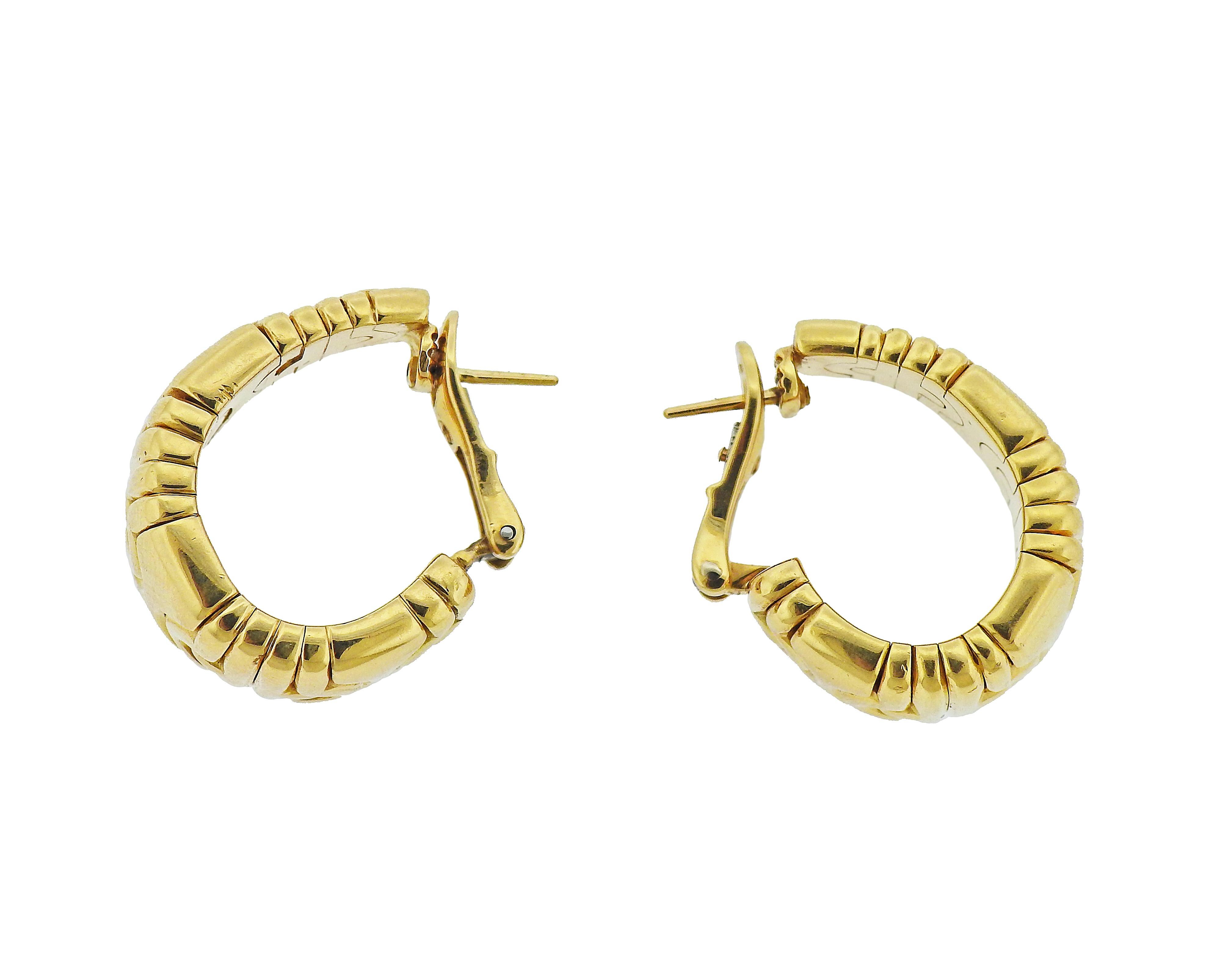 Pair of 18k yellow gold Parentesi hoop earrings by Bvlgari. Earrings are 26mm x 15mm wide. Marked: Bvlgari, made in Italy, 750. Weight - 47.4 grams.