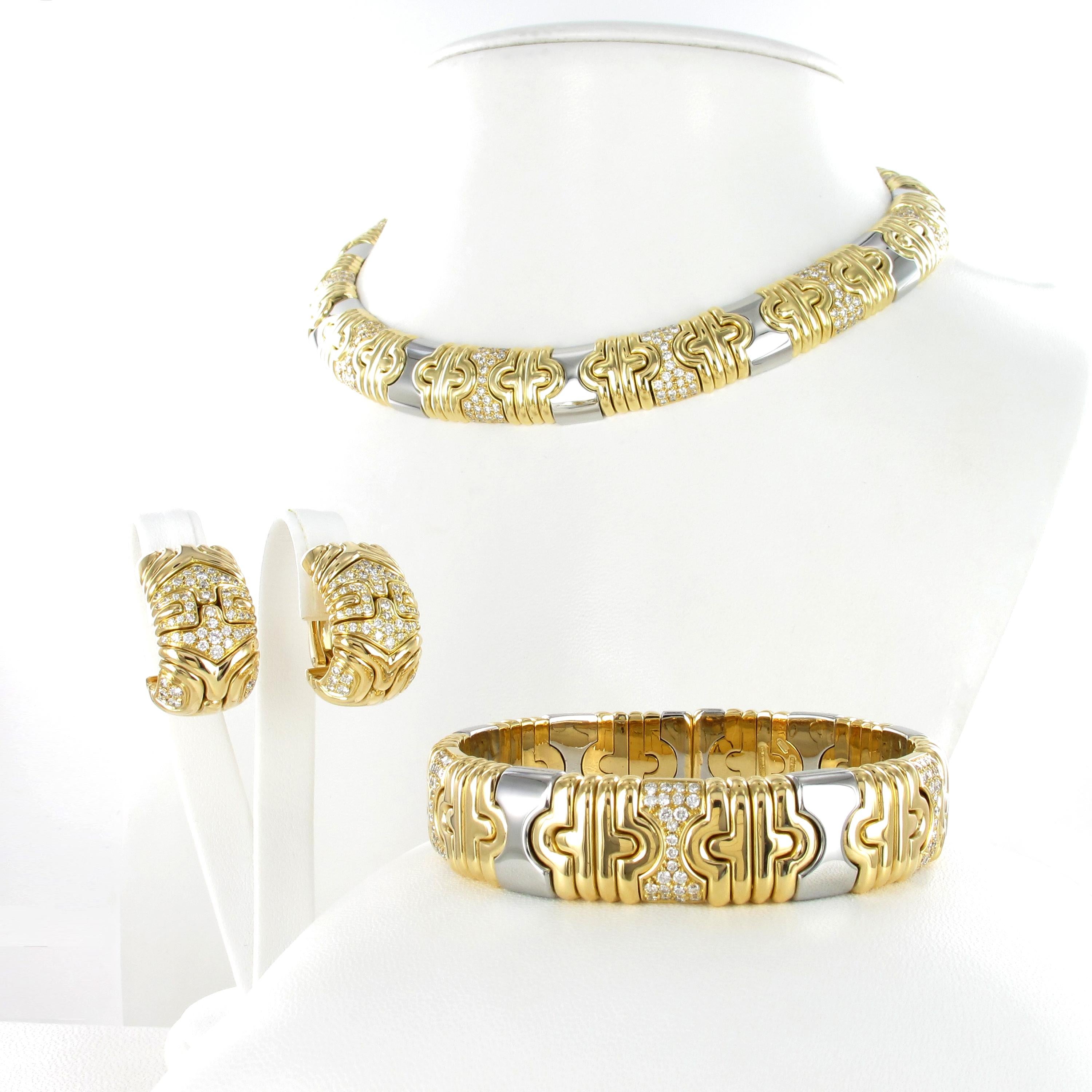 This beautiful set by the Italian jewellery icon Bulgari consists of three pieces, a necklace and bangle in 18 karat yellow gold and steel and a pair of ear clips in 18 karat yellow gold.

All three jewellery pieces are adorned with a carefully