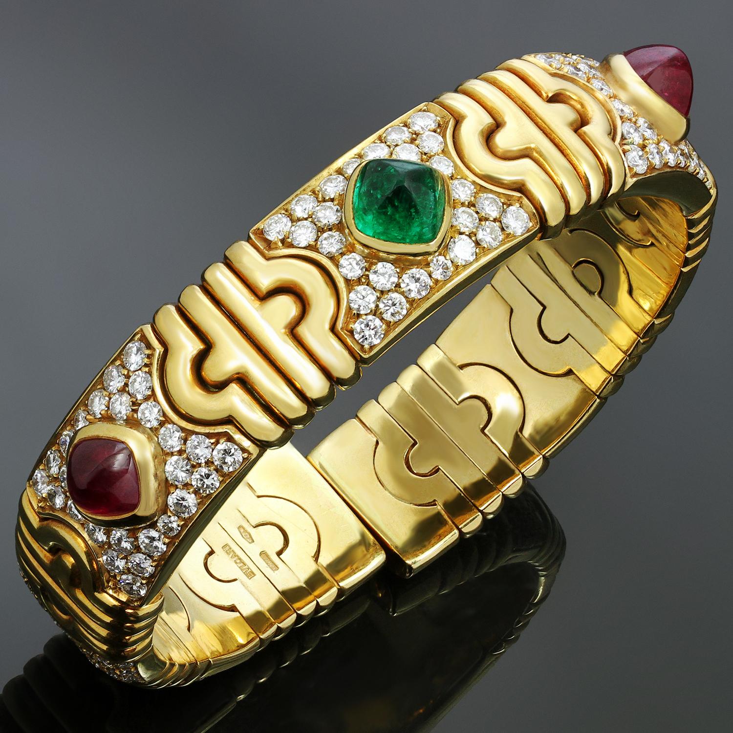 This fabulous Bulgari bracelet from the iconic Parentesi collection is crafted in 18k yellow gold and set with sugarloaf-cut cabochon emerald and rubies, in traparent bright crispy colors, and brilliant-cut round diamonds of an estimated 5.50