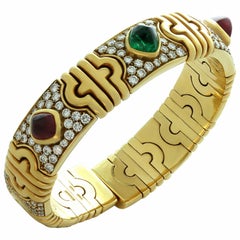 Bulgari Parentesi Sugarloaf Ruby Emerald Diamond Yellow Gold Cuff Bracelet