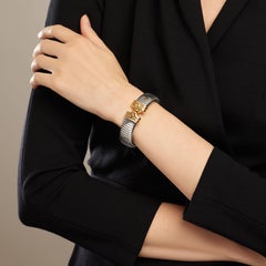 Bracciale a polsino BULGARI Vintage Parentesi Tubogas, oro 18 carati e acciaio, anni ’80