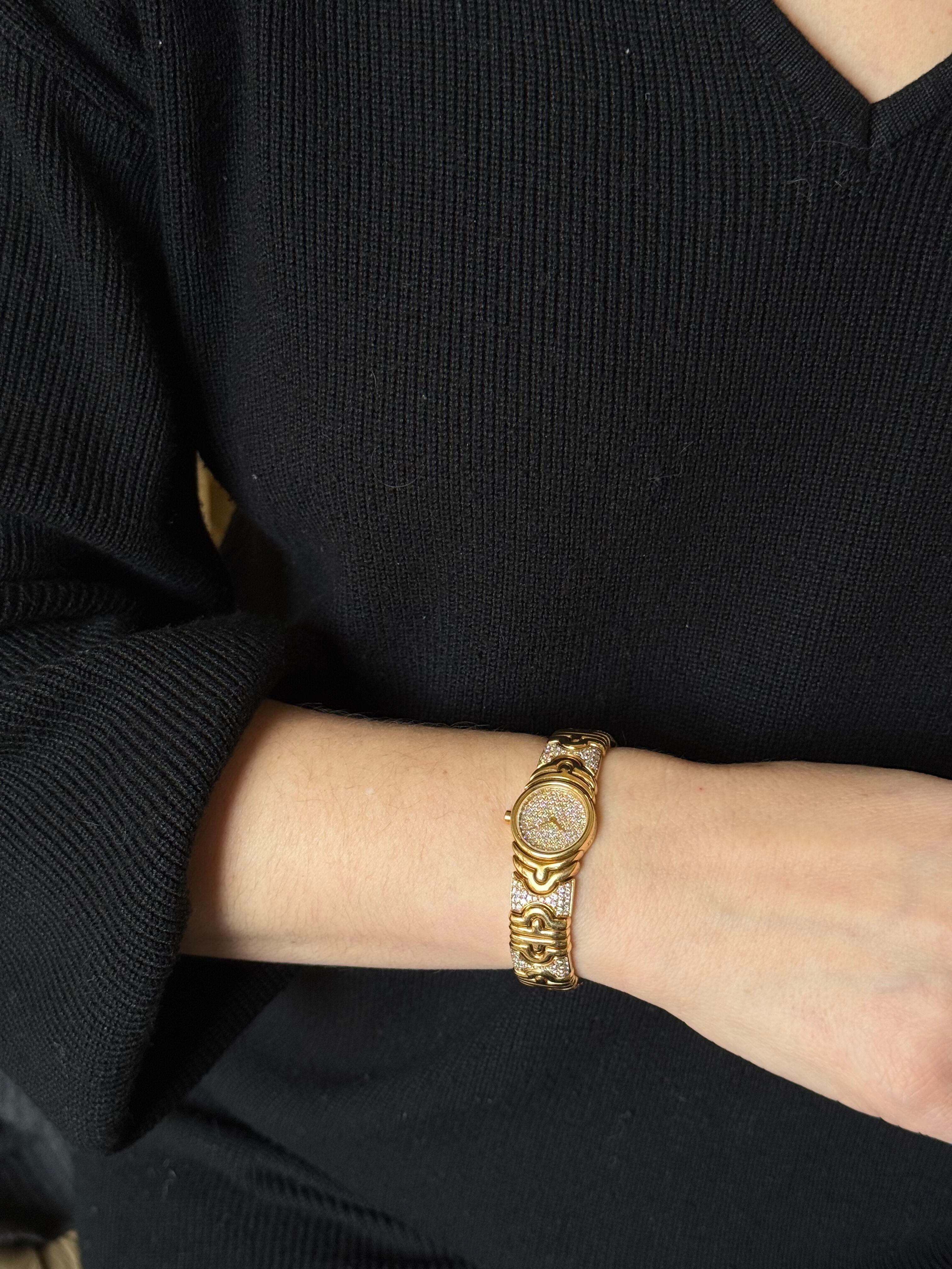 Iconic Parentesi watch bracelet by Bvlgari, set in 18k yellow gold, adorned with approx. 2.50ctw G/VS diamonds.  All diamond dial. Bracelet will fit approx. 7