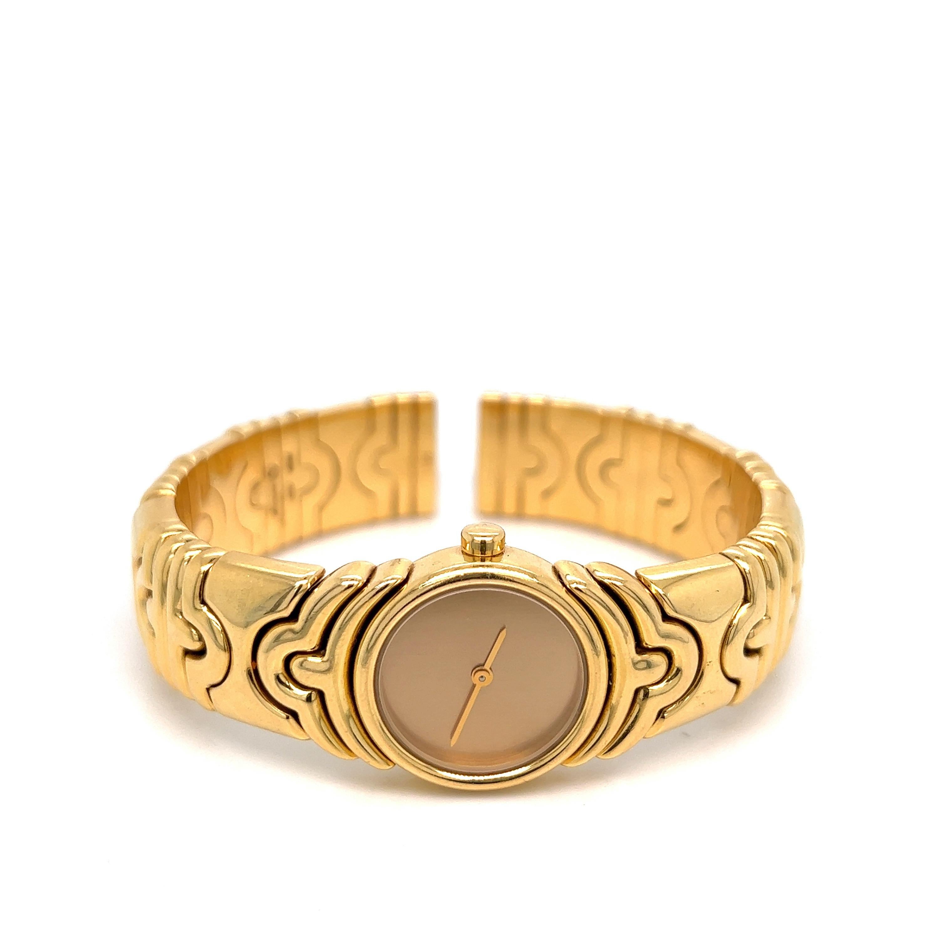 Classic Parentesi 18k gold bracelet watch by Bvlgari, with gold dial. Bracelet will fit approx. 6.75