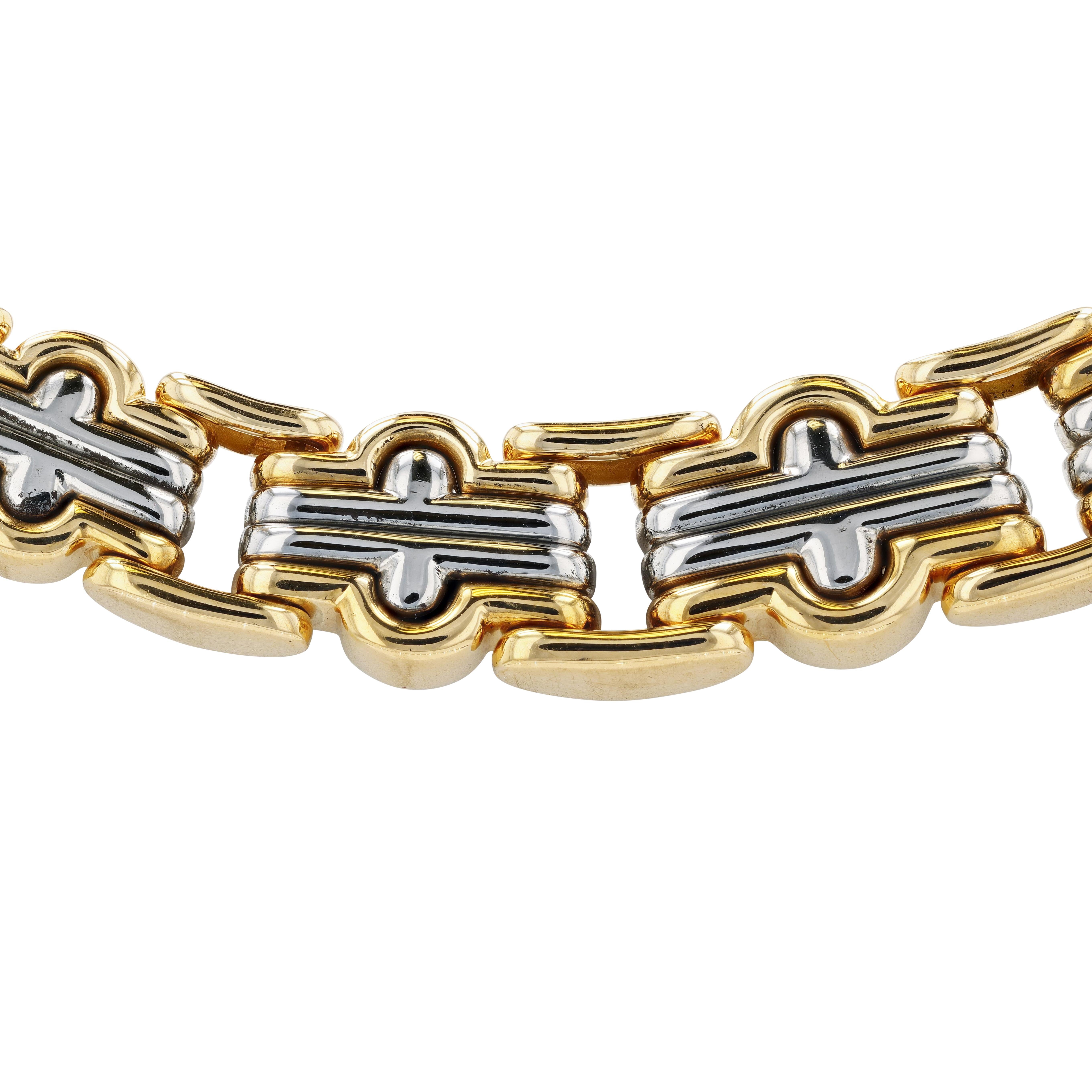 Bulgari Parentessi 18k yellow gold and stainless steel necklace featuring graduated links front to back with high polished finish and safety clasp. Signed Bulgari. Inner circumference 38.5 cm. 