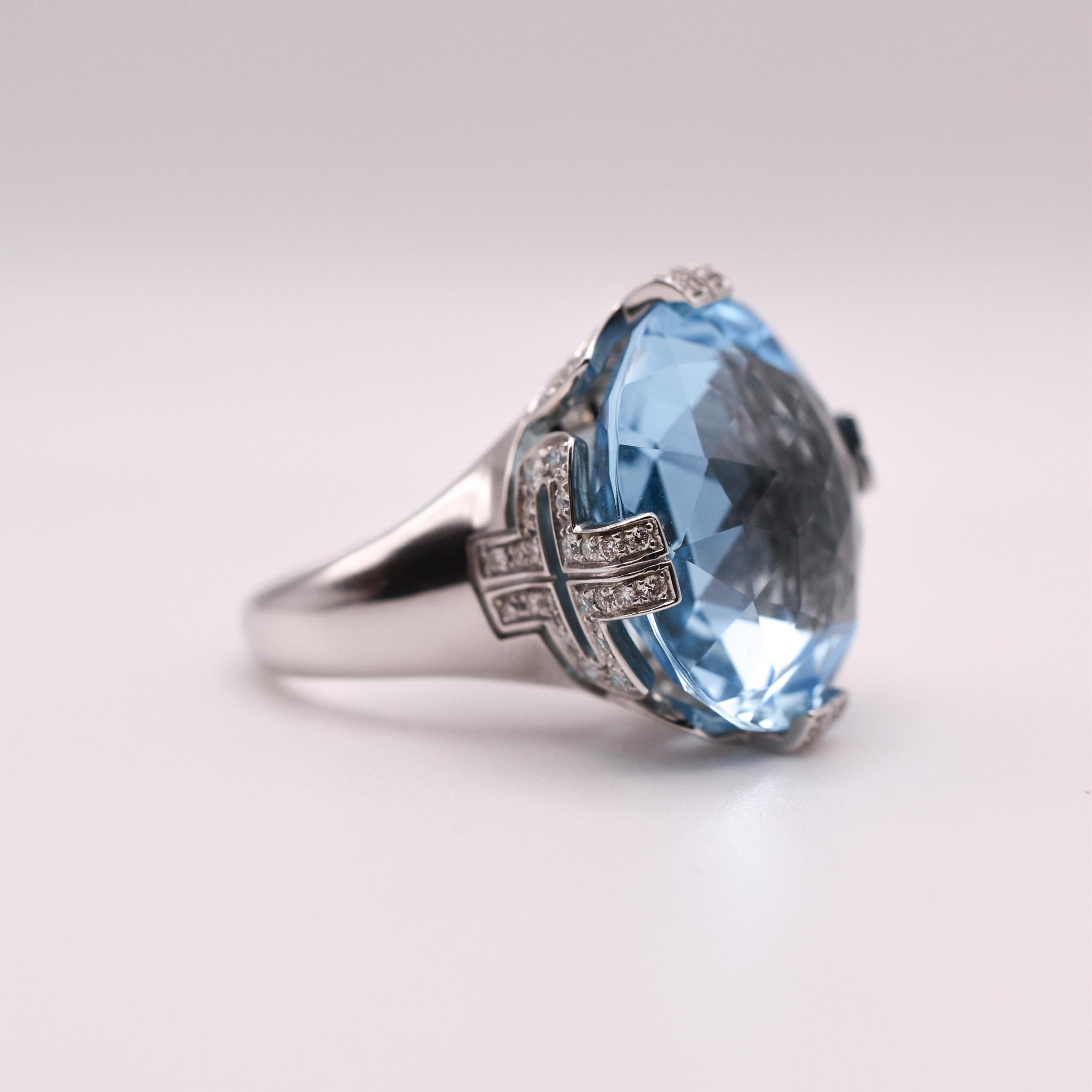 Bulgari 'Parenthesis' Blue Topaz & Diamond Cocktail Ring in 18k White Gold. 
Made in Italy, circa 1980.

US finger size 6.5