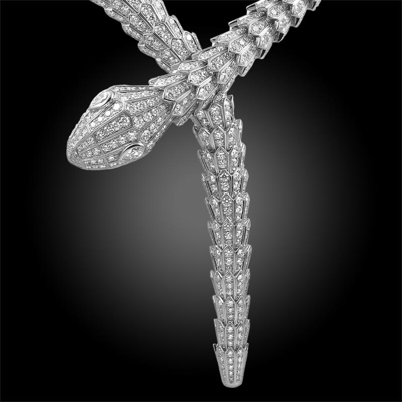 An extravagant and highly dramatic piece that captures the power and essence of mystery and seduction through the iconic Bulgari serpent. This magnificent Serpenti necklace sensually coils around the neck exposing its layered 18k white gold scales