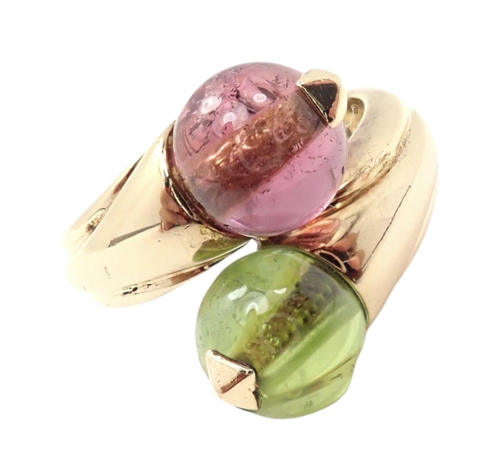 18k Yellow Gold Pink & Green Tourmaline Bypass Ring By Bulgari. 
With 1 round bead cut pink tourmaline 7.5mm and 1 round bead cut green tourmaline 7.5mm
Details:
Ring Size: 4.5 (resize available)
Width: 15mm
Weight: 9 grams
Stamped Hallmarks: