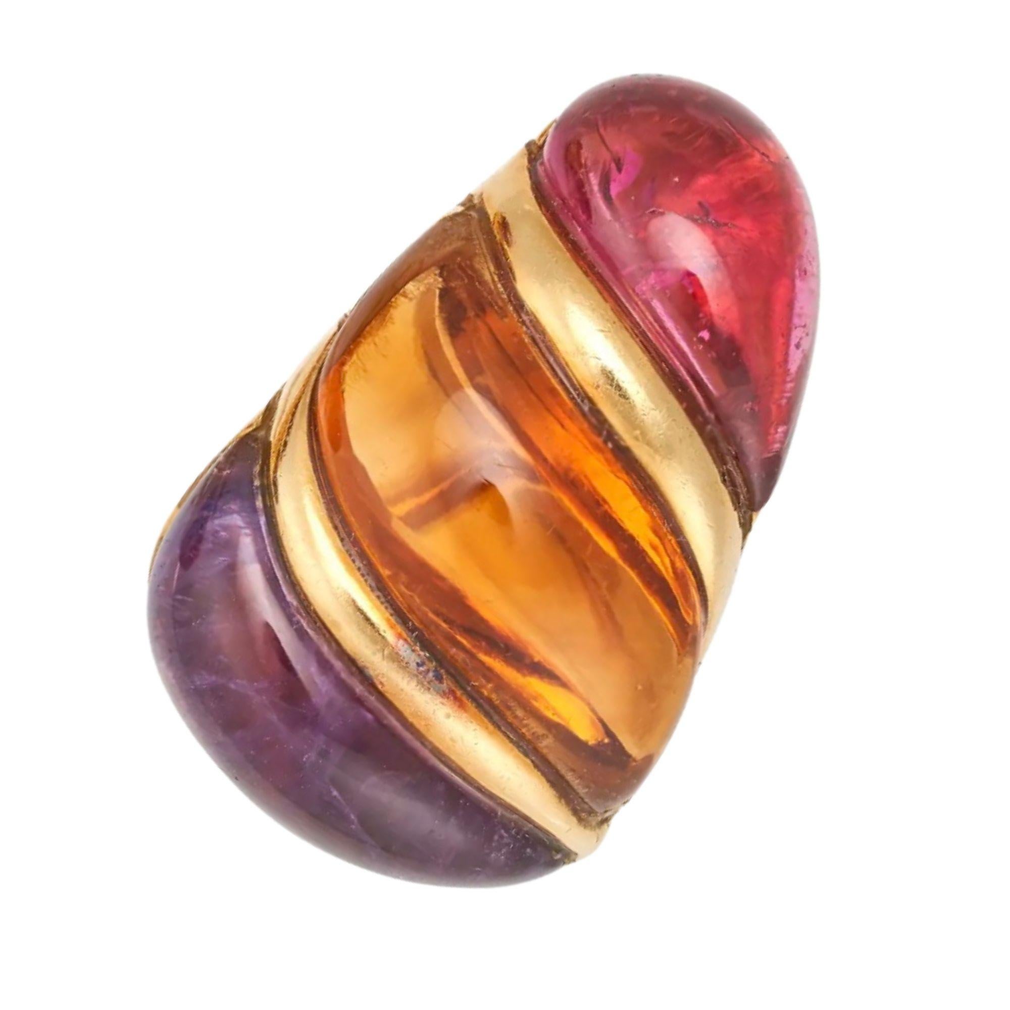 Bulgari swirls together the candy colors of pink tourmaline, amethyst and citrine into these slightly elongated ear clips. Made in 1990 and in 18k yellow gold they represent the best of the Bulgari brand. 

Made in 1990
18k yellow gold 
Polished