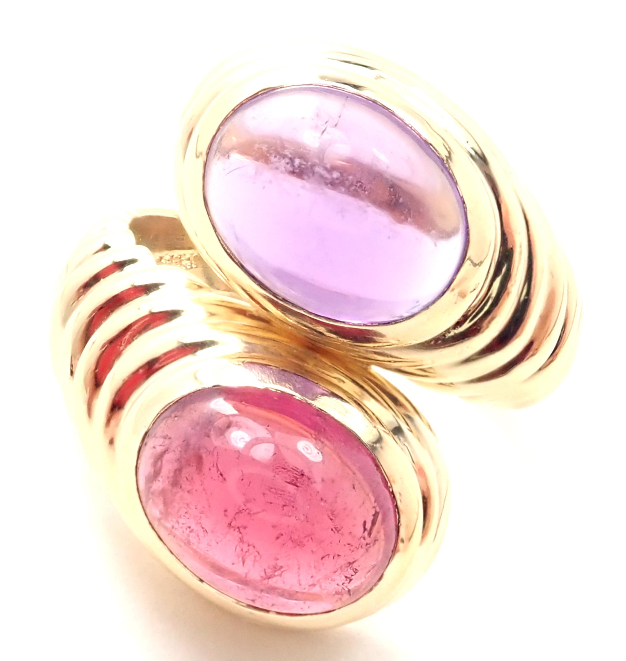 18k Yellow Gold Pink Tourmaline And Amethyst Ring By Bulgari. 
With 1 Oval Pink Tourmaline 7mm x 10mm and 
1 Oval Amethyst 7mm x 10mm
Details:
Ring Size: 4.5 (resize available)
Width: 20mm
Weight: 13.1 grams
Stamped Hallmarks: Bulgari, 750,