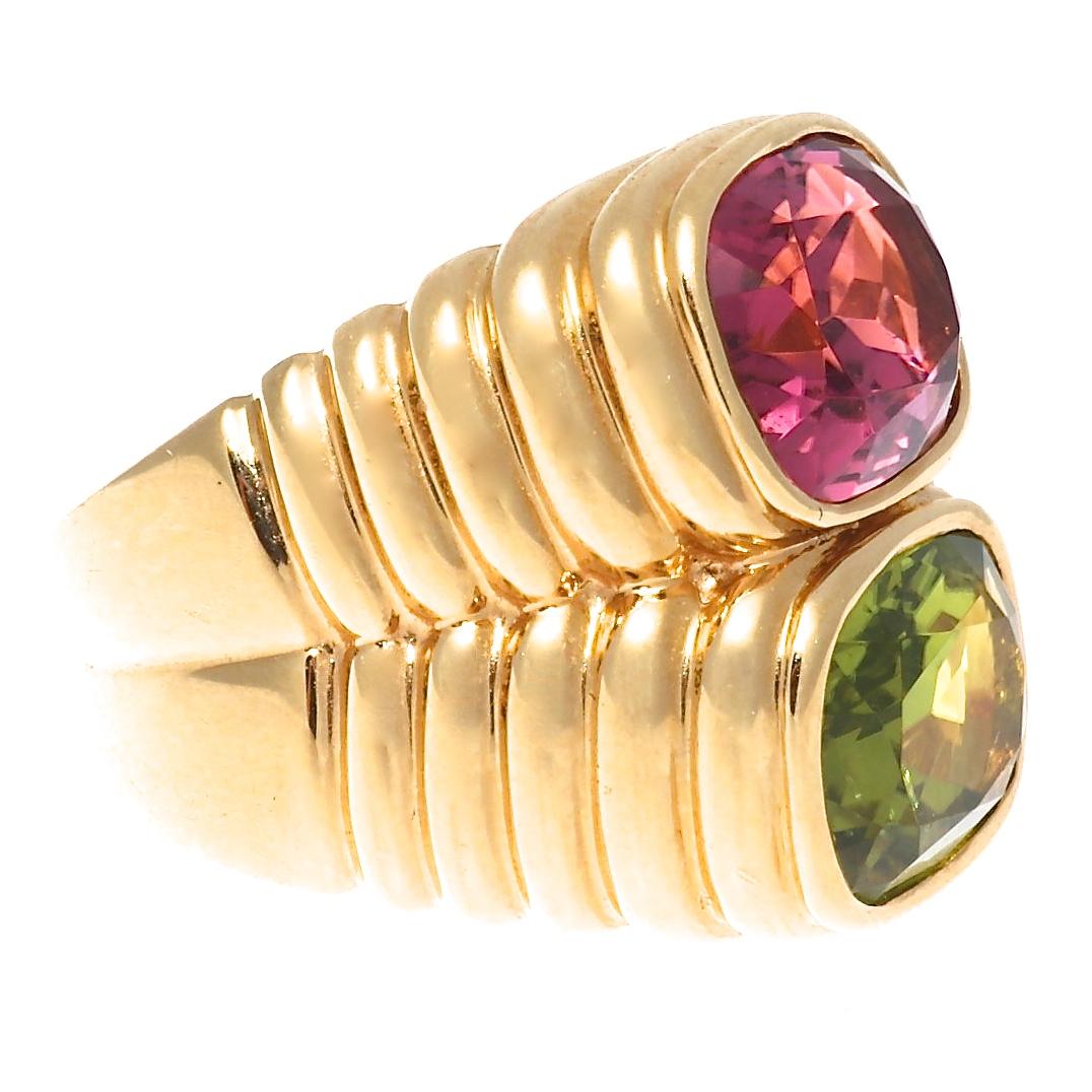 Maybe Bulgari was paying homage to the beauty of Spring with this sparkling pink and green ring. With classic Bulgari lines we have come to recognize without a doubt to be one of the most iconic jewelry houses in history, this two stone ring