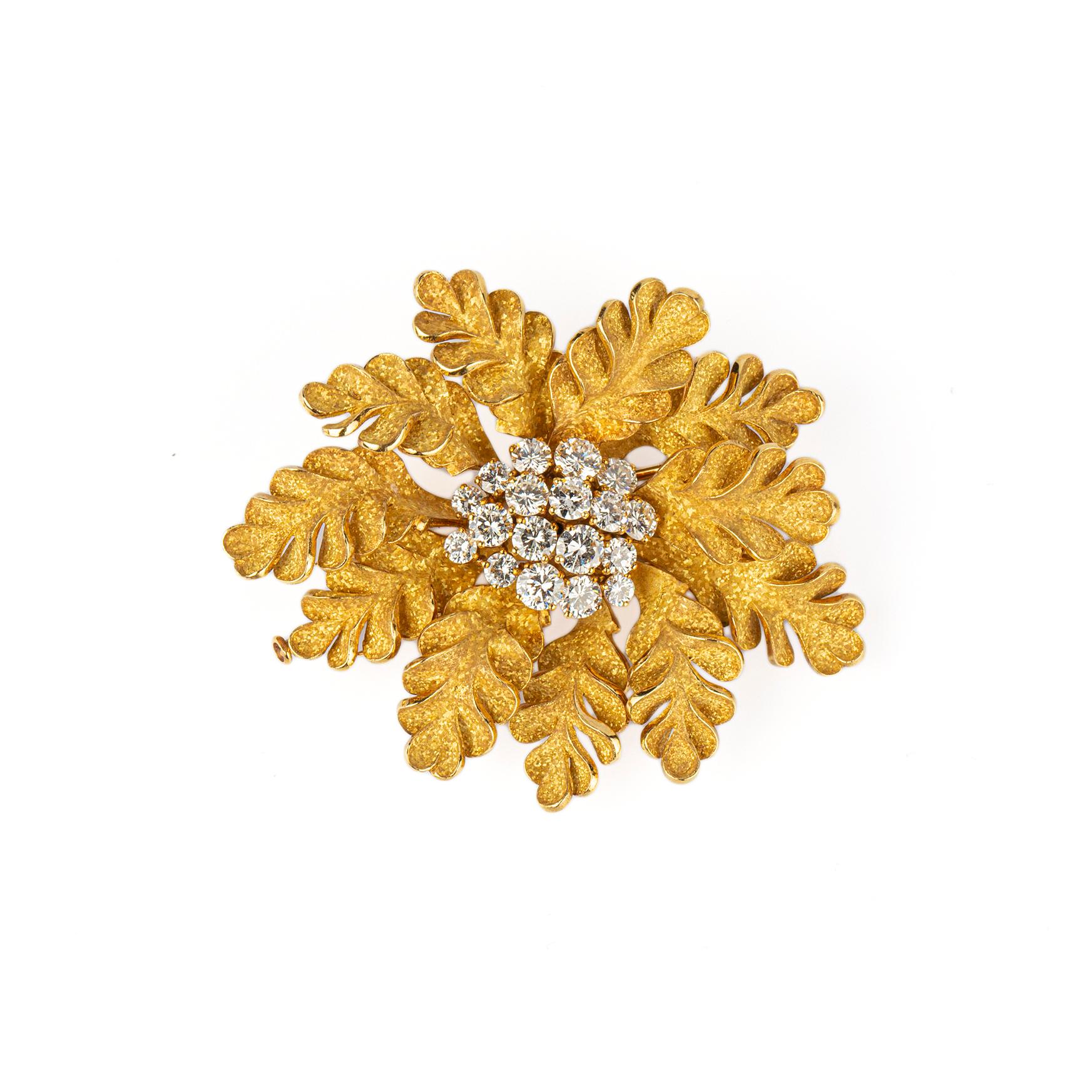 Bulgari 18k Yellow Gold and Diamond brooch of foliate design, set with approximately 3.5 carats of diamonds. Made in Italy, circa 1970 

This brooch is a highly collectible item as a similar one is published in the Bulgari book.