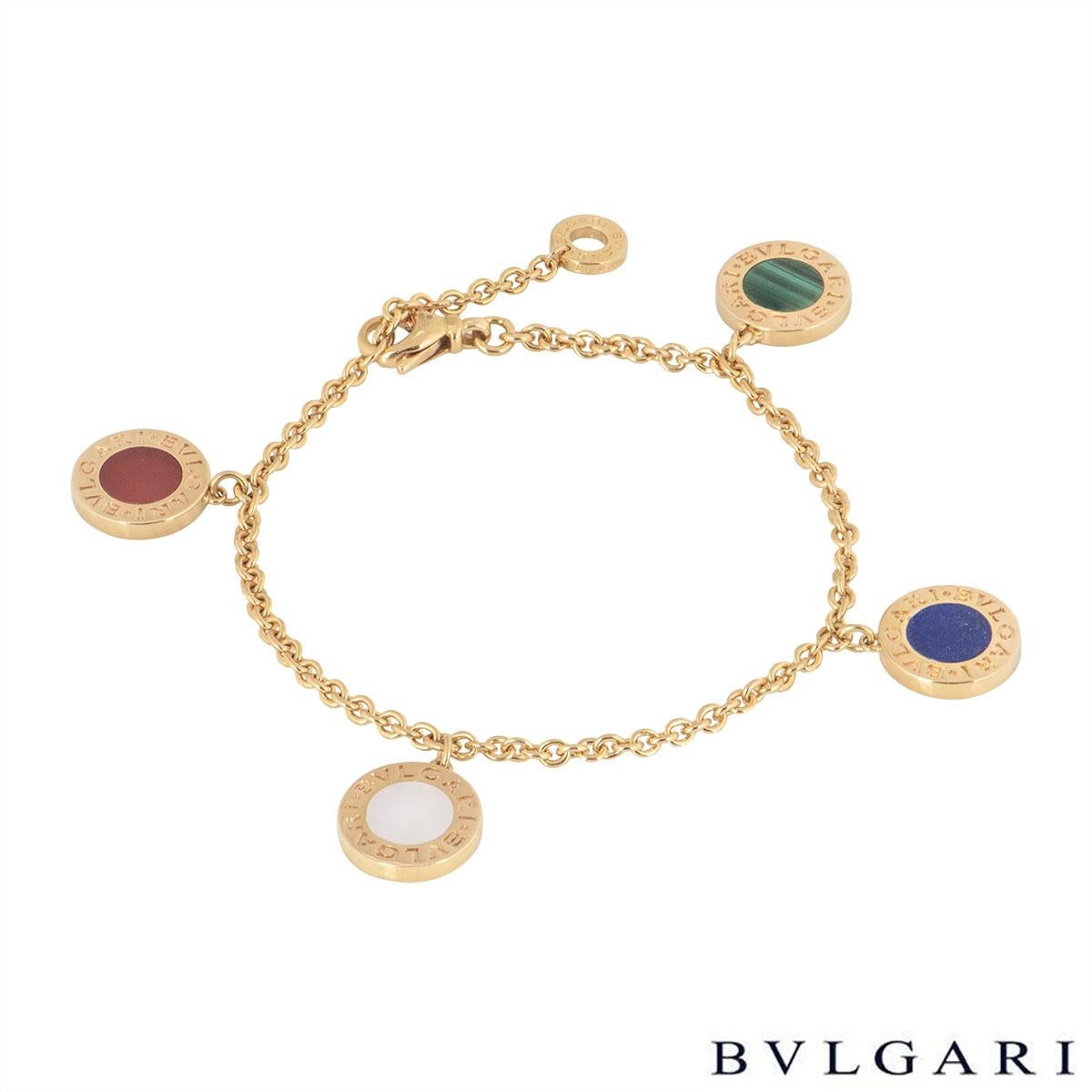 An 18k rose gold bracelet by Bvlgari from the 'Bvlgari Bvlgari' collection. The bracelet features 4 circular disks set with carnelian, lapis, malachite and mother of pearl to both sides. The bracelet features a lobster clasp with a length of