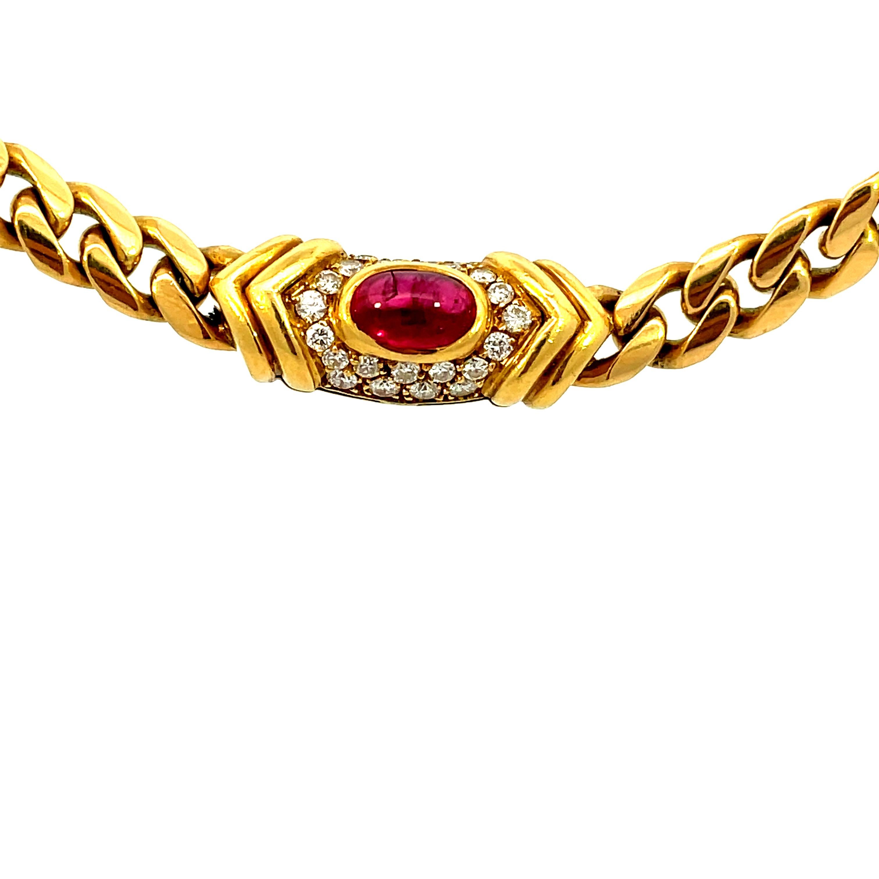 A beautiful and real 1970`s Vintage Bulgari chain necklace featuring a 1.21 carat  Vivid Red Ruby surrounded by diamonds and suspended from an 18 karat yellow gold chain. Made in Italy.

Length: cm 39,5 Stamped, with the maker's mark, the Italian