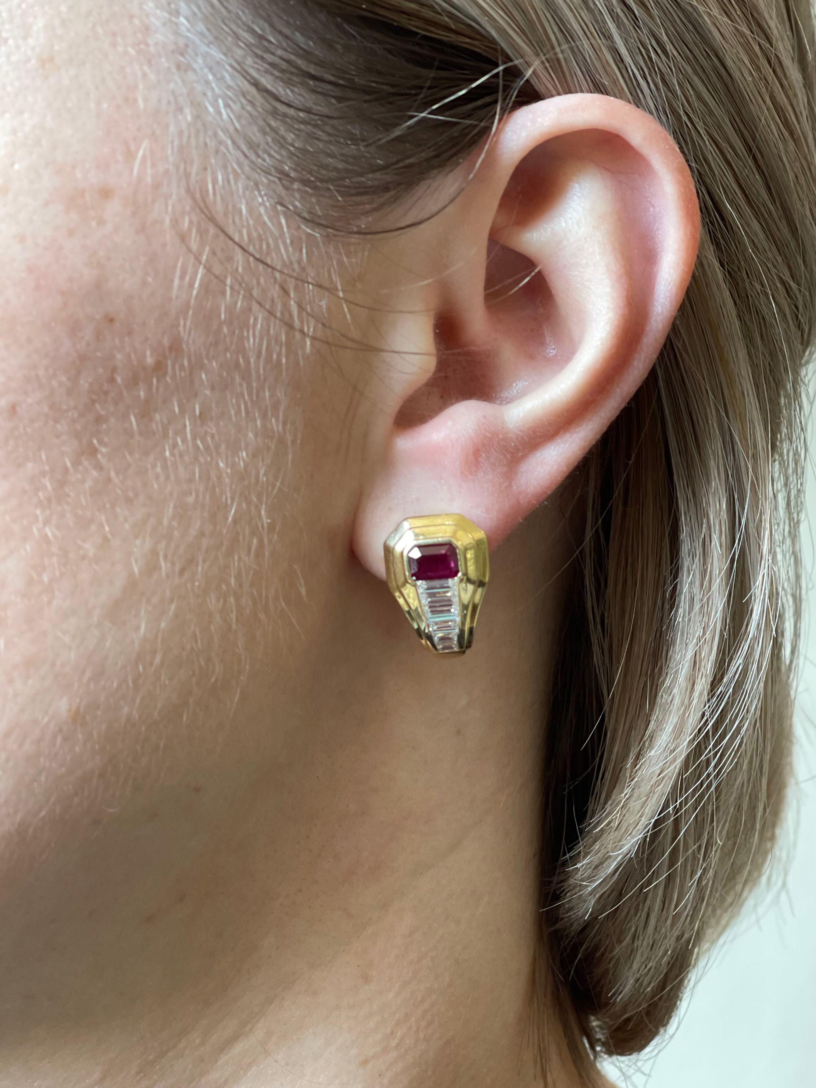 Pair of classic 18k gold earrings by Bvlgari, with vibrant rubies and baguette diamonds - approx. 0.90ctw G/VS. Earrings measure 0.75