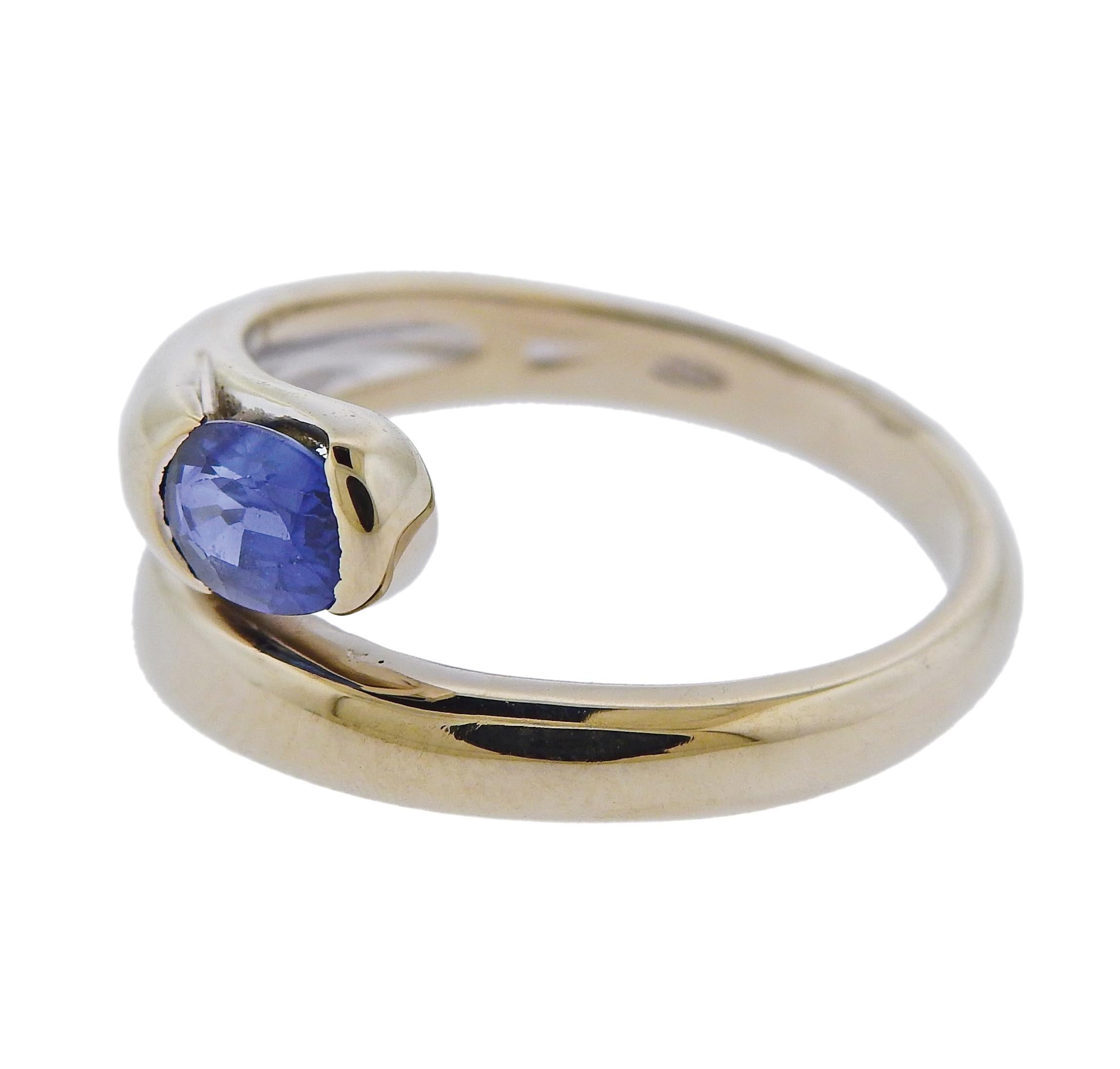 18k white gold Bvlgari ring with approx. 0.70ct oval sapphire.  Ring size - 5.5, ring top is 8mm wide. Weight is 5.6 grams. Marked 7750, Bvlgari. 