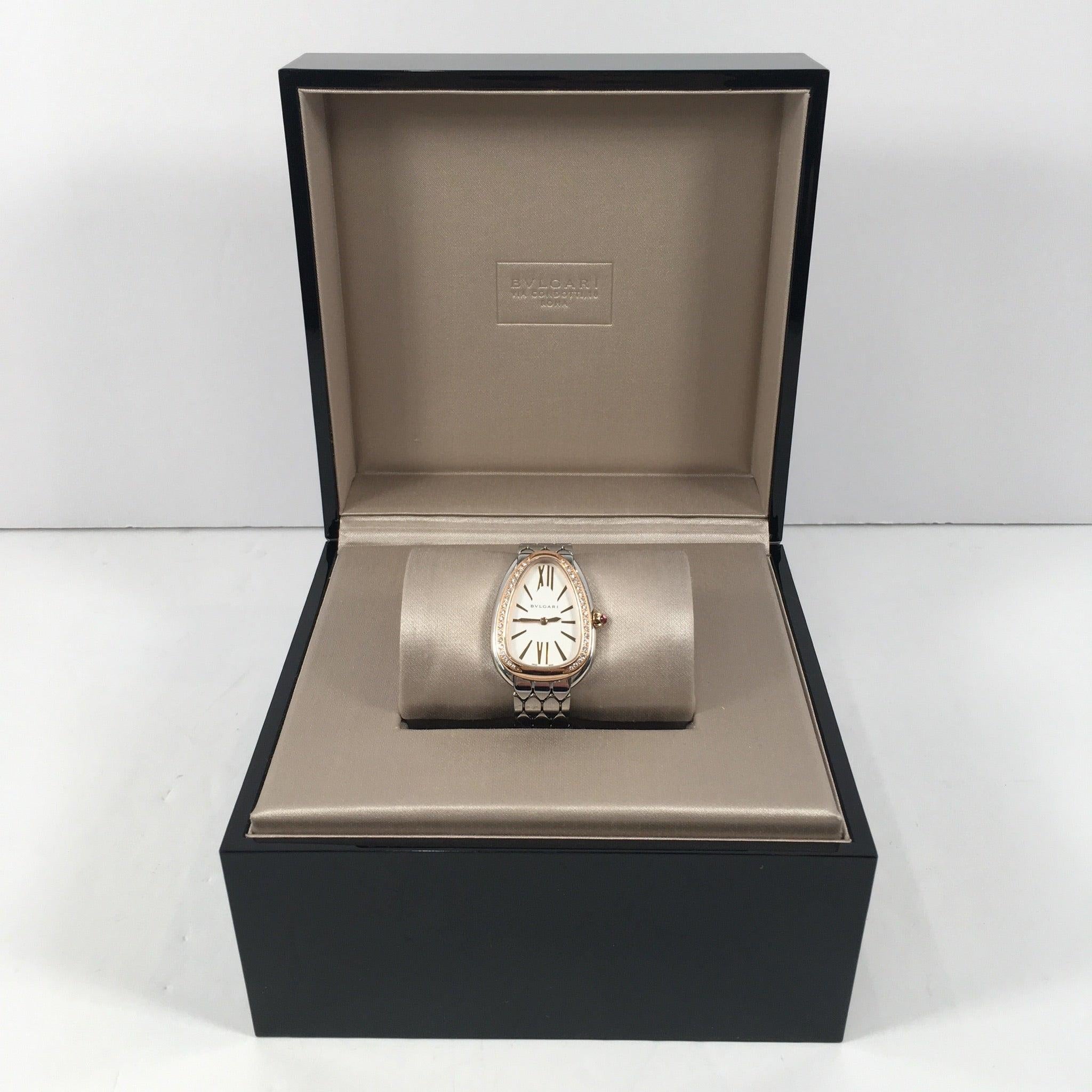 Bulgari Serpent Seduttori Diamond Watch

This is an authentic Bulgari Serpent Seduttori watch. This watch features a stainless steel case, stainless steel bracelet, 18 kt rose gold bezel set with diamonds and a white silver opaline dial. The case is