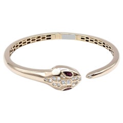Bulgari Serpenti Armreif aus 18 Karat Roségold mit Diamanten, roten und rosa Rubelliten, Größe M